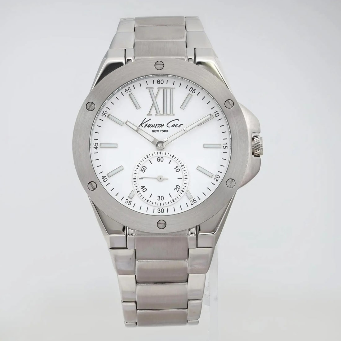 Kenneth Cole 40mm White Dial Unisex Quartz Watch Gray Stainless Steel Bracelet: Kenneth Cole 40mm White Dial Unisex Quartz Watch Gray Stainless Steel Bracelet Introducing the Kenneth Cole 40mm Stainless Steel White Dial Unisex Quartz Watch, a perfect blend of style and functional