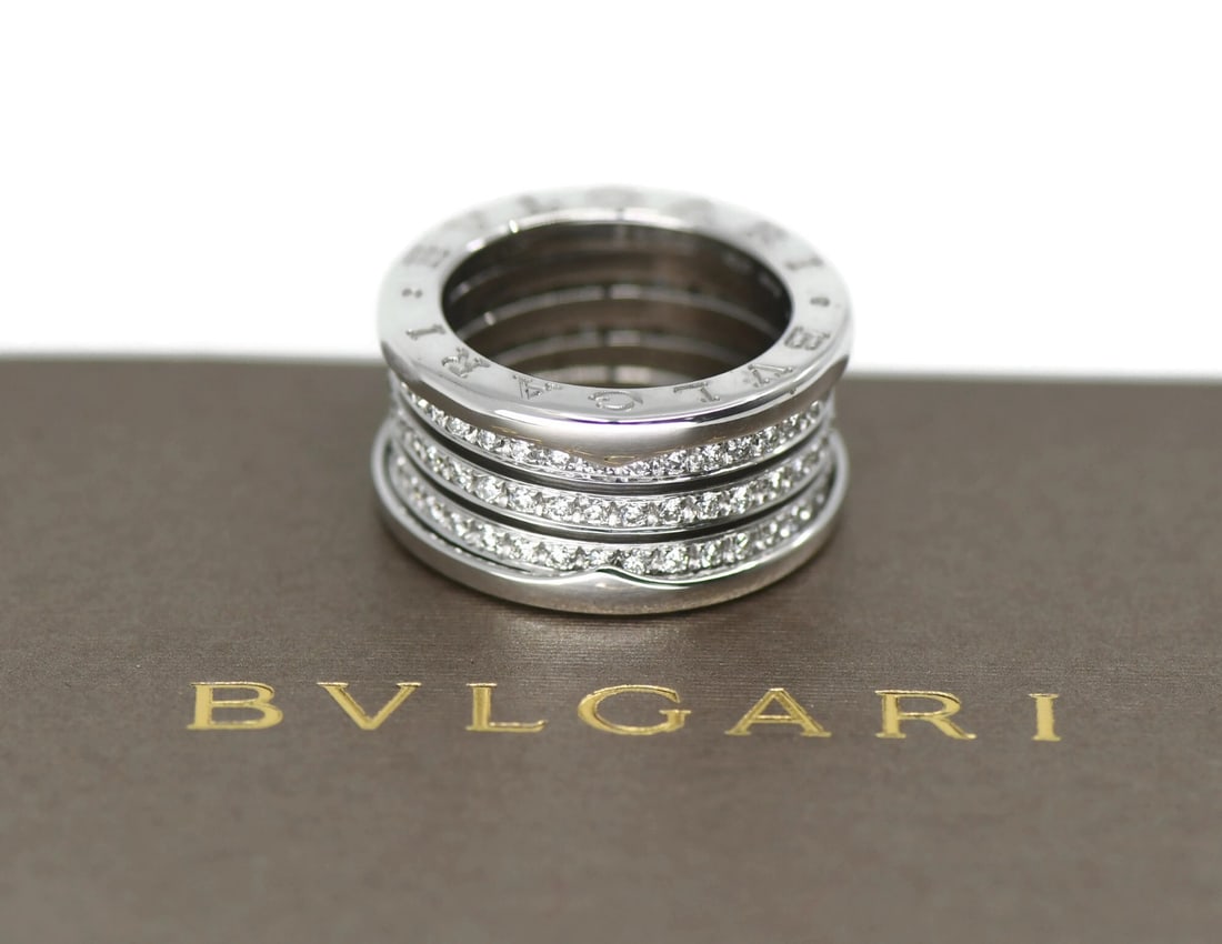 Bvlgari B.Zero1 18K White Gold Diamond Ring Size 51: Bvlgari B.Zero1 18K White Gold Diamond Ring Size 51 Pre-owned Bvlgari B.zero1 ring crafted in 18k white gold and set with diamond accents. This Italy-made ring comes with its box and features the dist