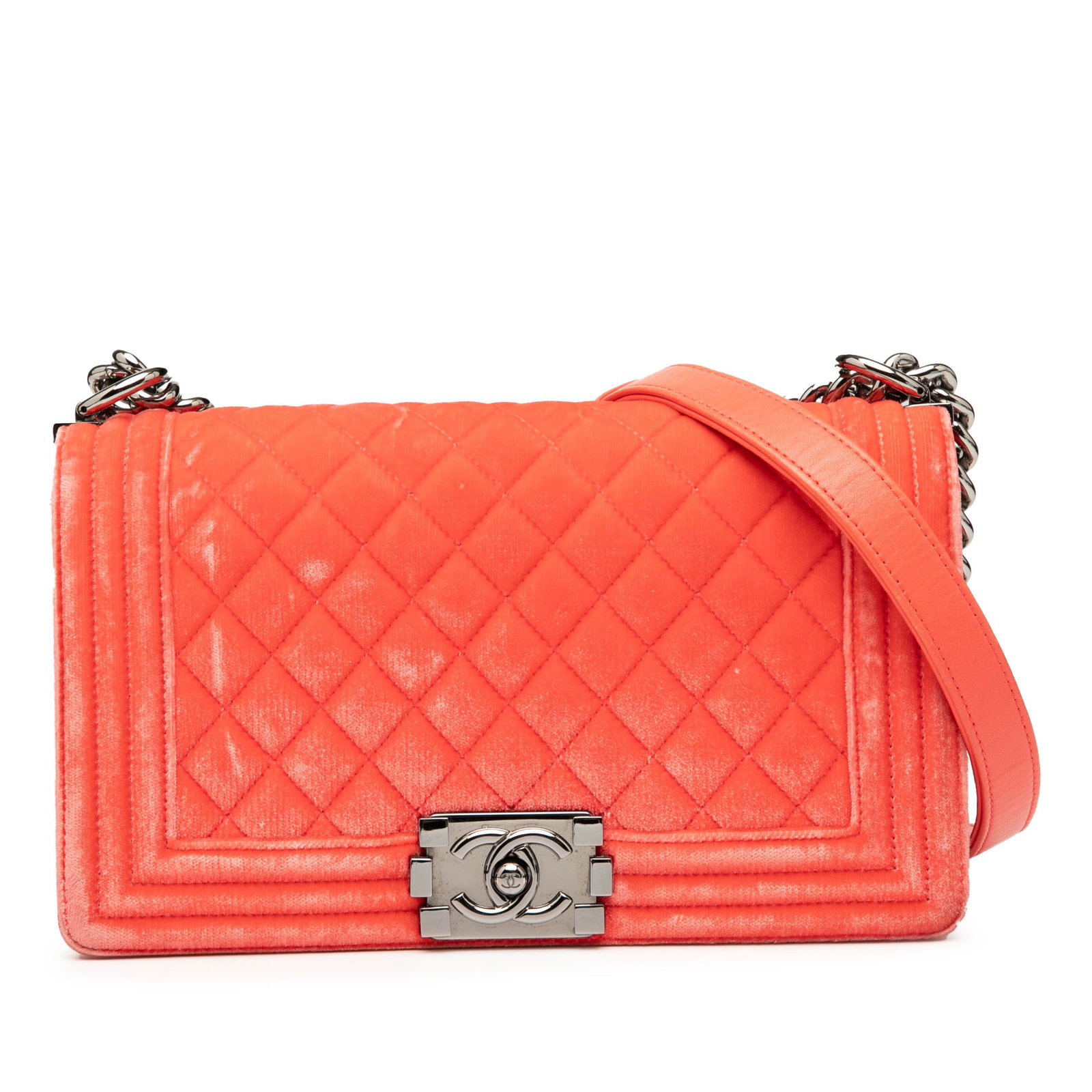 Chanel Old Medium Quilted Velvet Boy Flap Bag Orange: Chanel Old Medium Quilted Velvet Boy Flap Bag Orange This Chanel Old Medium Quilted Velvet Boy Flap bag showcases a luxurious quilted velvet exterior in an eye-catching orange hue. It features a styli