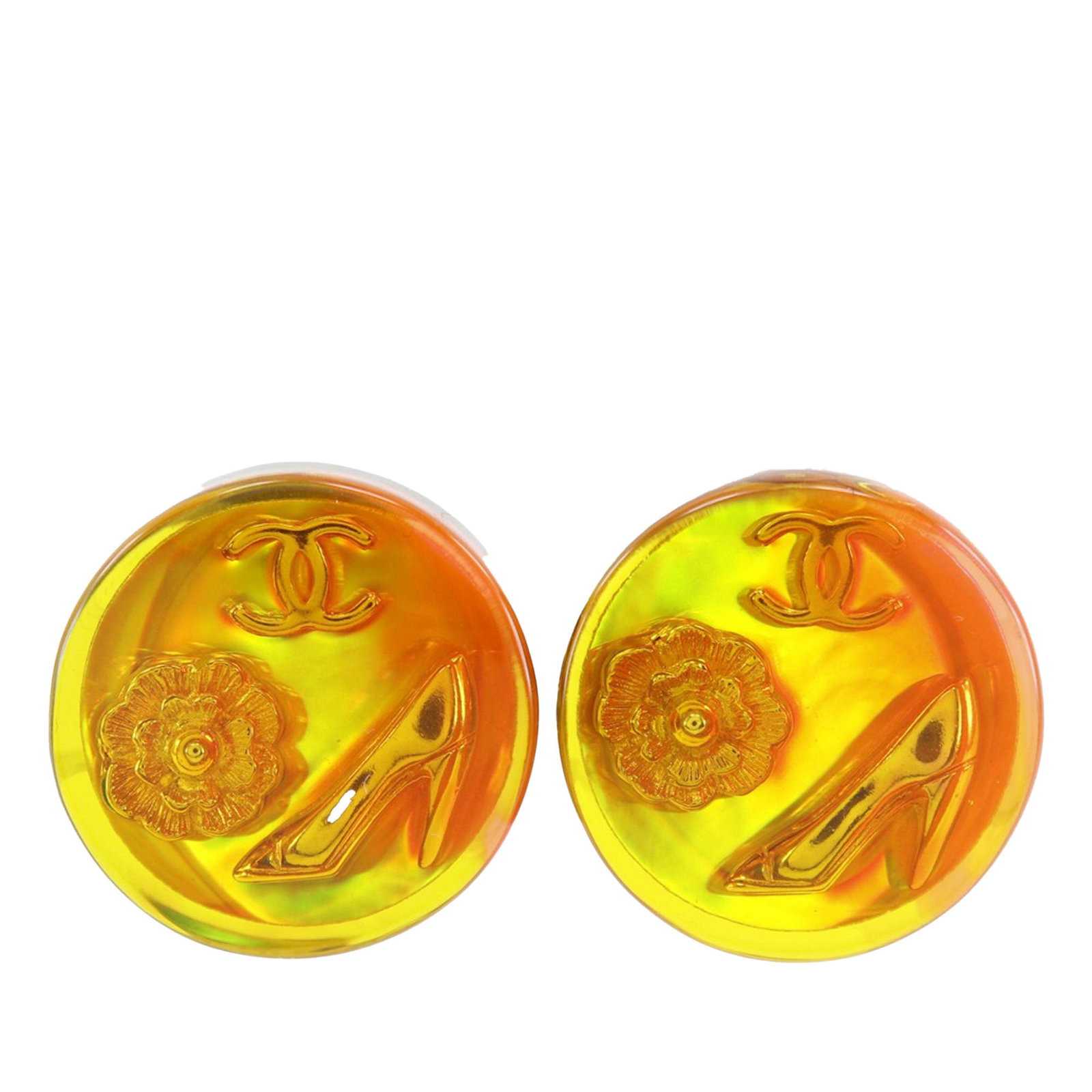 Chanel camellia shoe clip on earrings gold plated resin: Chanel camellia shoe clip on earrings gold plated resin These Chanel clip-on earrings feature a gold-plated body with resin camellia and CC logo details. Crafted in France, the earrings showcase a sty