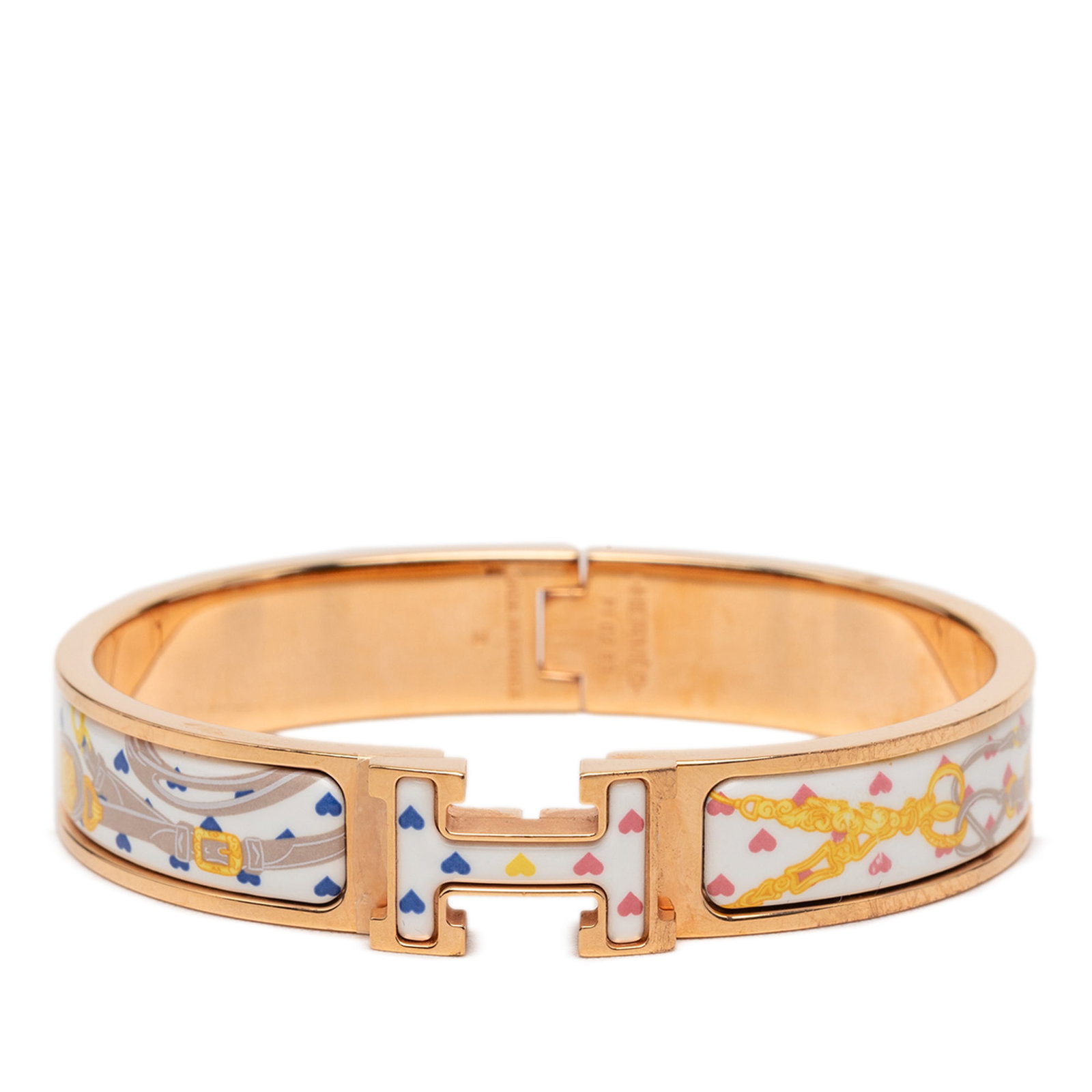 Hermes Brides de Gala Love Clic H PM Narrow Enamel Bracelet: Hermes Brides de Gala Love Clic H PM Narrow Enamel Bracelet Hermes Narrow Enamel Brides de Gala Love Clic H Bracelet PM with a printed enamel body and gold-tone metal accents. This bracelet features