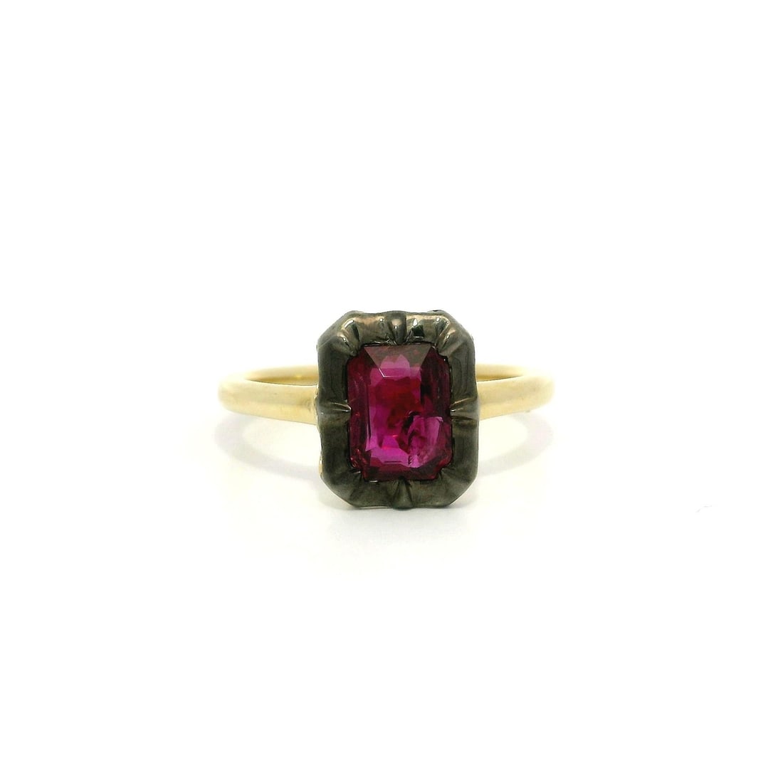 18k Gold Ruby Solitaire Ring GIA Certified 1.53ct Emerald Cut: 18k Gold Ruby Solitaire Ring GIA Certified 1.53ct Emerald Cut This exquisite ring showcases a stunning natural ruby, set in a unique collet design. The emerald cut ruby weighs 1.53 carats and features