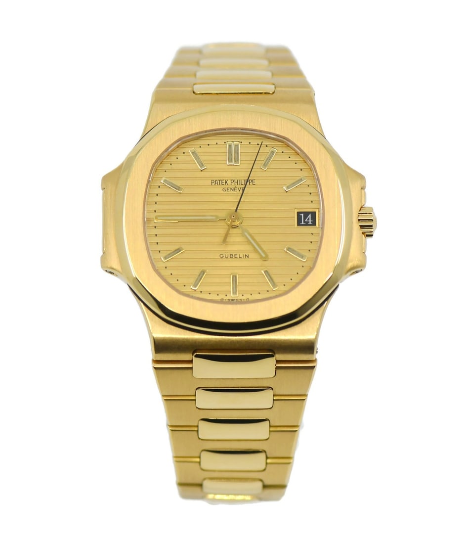 Patek Philippe Nautilus 3800 1J Gubelin 18K Yellow Gold Wristwatch: Patek Philippe Nautilus 3800 1J Gubelin 18K Yellow Gold Wristwatch Patek Philippe Nautilus Gubelin 18K Yellow Gold wristwatch, reference 3800/1J, with a gold bezel, gold case, and yellow gold band. It