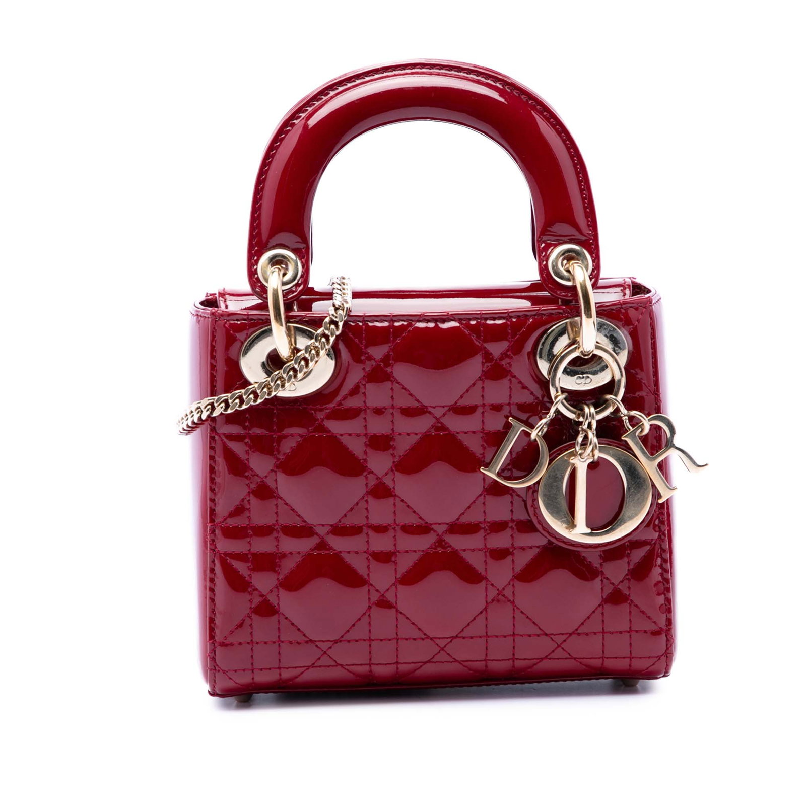 Dior Lady Dior Mini Cannage Patent Leather Bag Red: Dior Lady Dior Mini Cannage Patent Leather Bag Red Mini Lady Dior bag in red patent leather with a quilted Cannage body. It features flat top handles, a detachable flat leather strap, a flap closure, 