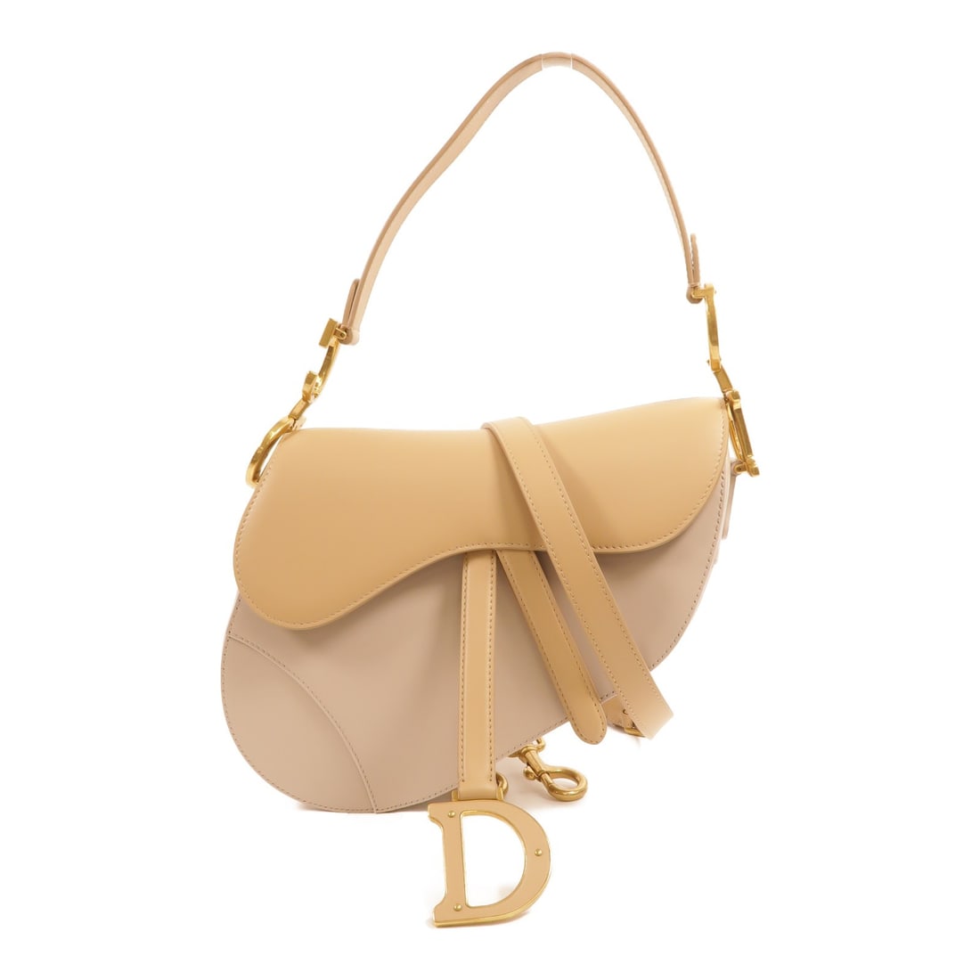 Dior Saddle Medium Beige Calfskin Shoulder Bag with Strap: Dior Saddle Medium Beige Calfskin Shoulder Bag with Strap A Christian Dior Saddle medium shoulder bag in beige calfskin leather with gold-tone hardware. It features a magnetic pocket, one outside open