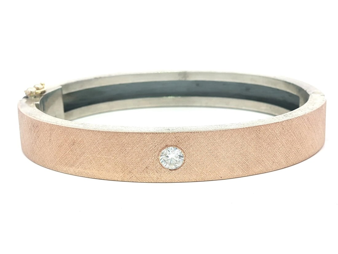 Rene Escobar 18k Rose Gold Diamond Hinged Bangle Bracelet: Rene Escobar 18k Rose Gold Diamond Hinged Bangle Bracelet This exquisite hinged bangle bracelet features a stunning combination of solid sterling silver and 18k rose gold, adorned with a natural genui