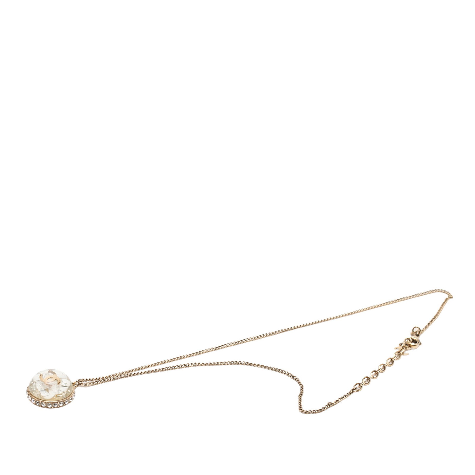 Chanel CC Gold Plated Resin Strass Pendant Necklace: Chanel CC Gold Plated Resin Strass Pendant Necklace This Chanel necklace features a gold tone metal body adorned with resin and rhinestone details, showcasing a clear dome hologram glitter pendant. Th