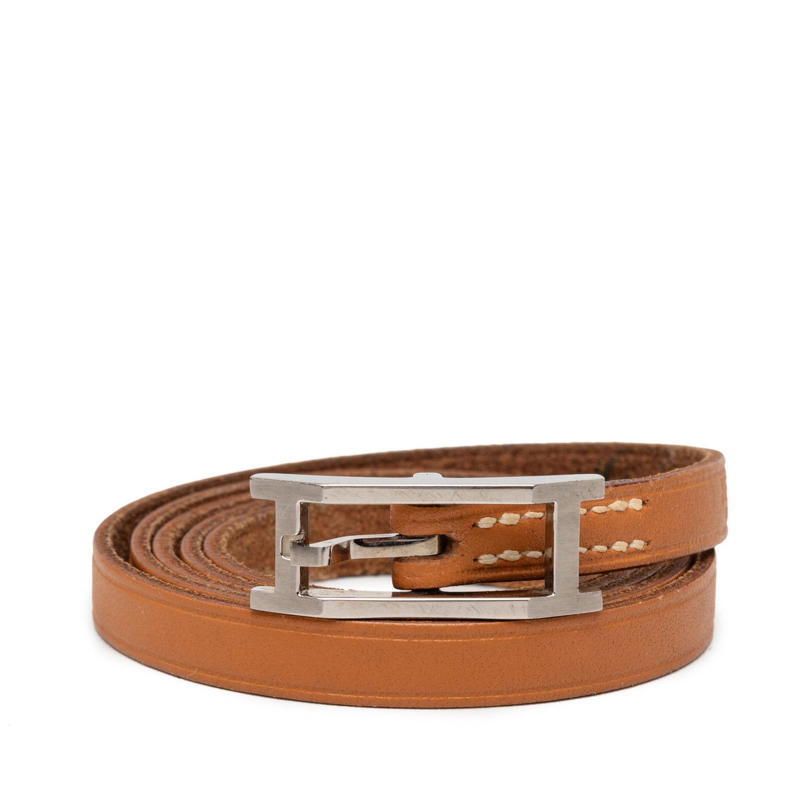 Hermes Behapi Double Tour Leather Bracelet Brown: Hermes Behapi Double Tour Leather Bracelet Brown Hermes Behapi Double Tour bracelet crafted in brown leather with a palladium-plated buckle closure. Made in France, this costume jewelry piece shows vi