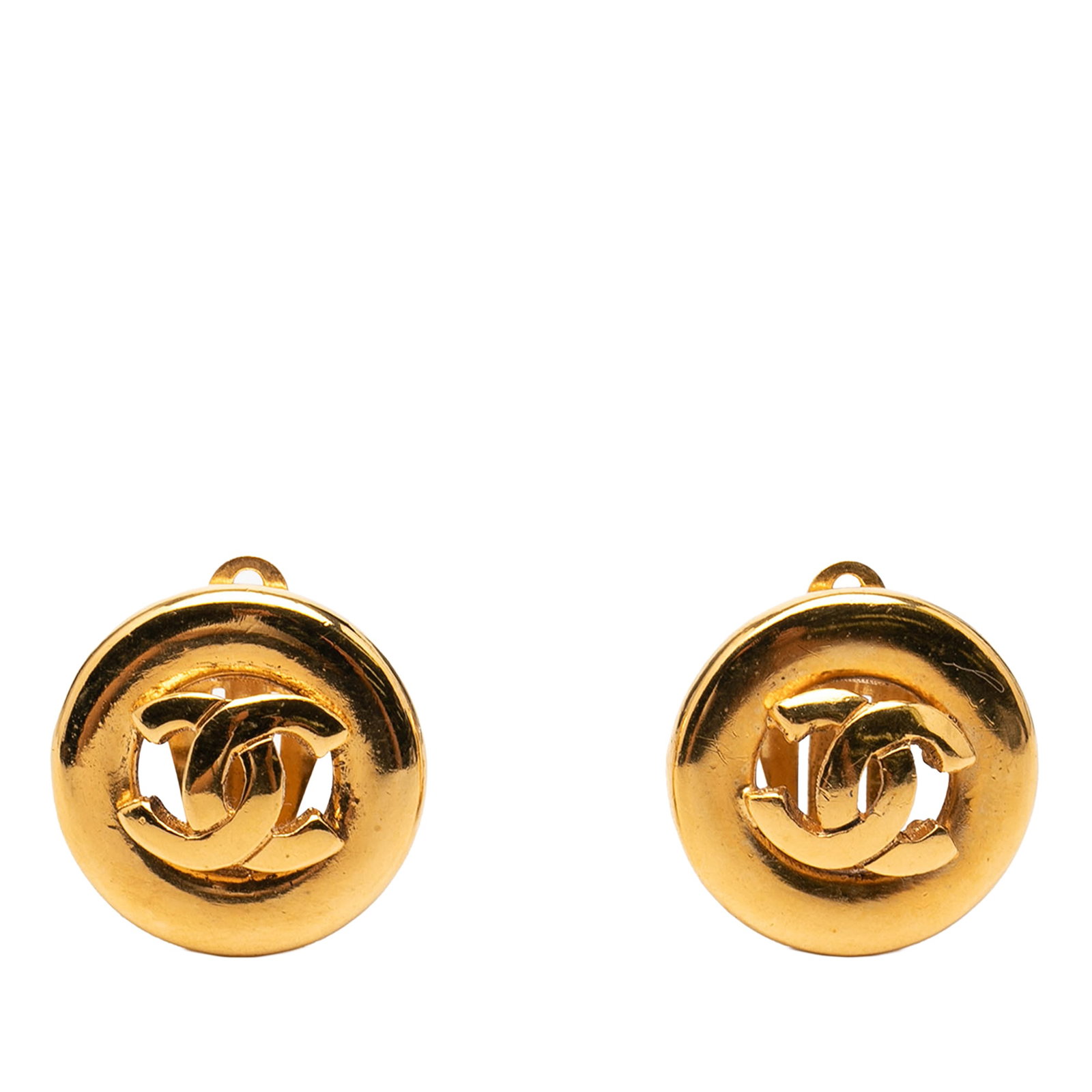 Chanel Gold Plated CC Clip On Round Earrings: Chanel Gold Plated CC Clip On Round Earrings These Chanel CC round clip-on earrings feature a gold-plated metal construction and a classic design. Made in France, they are designed for non-pierced ear