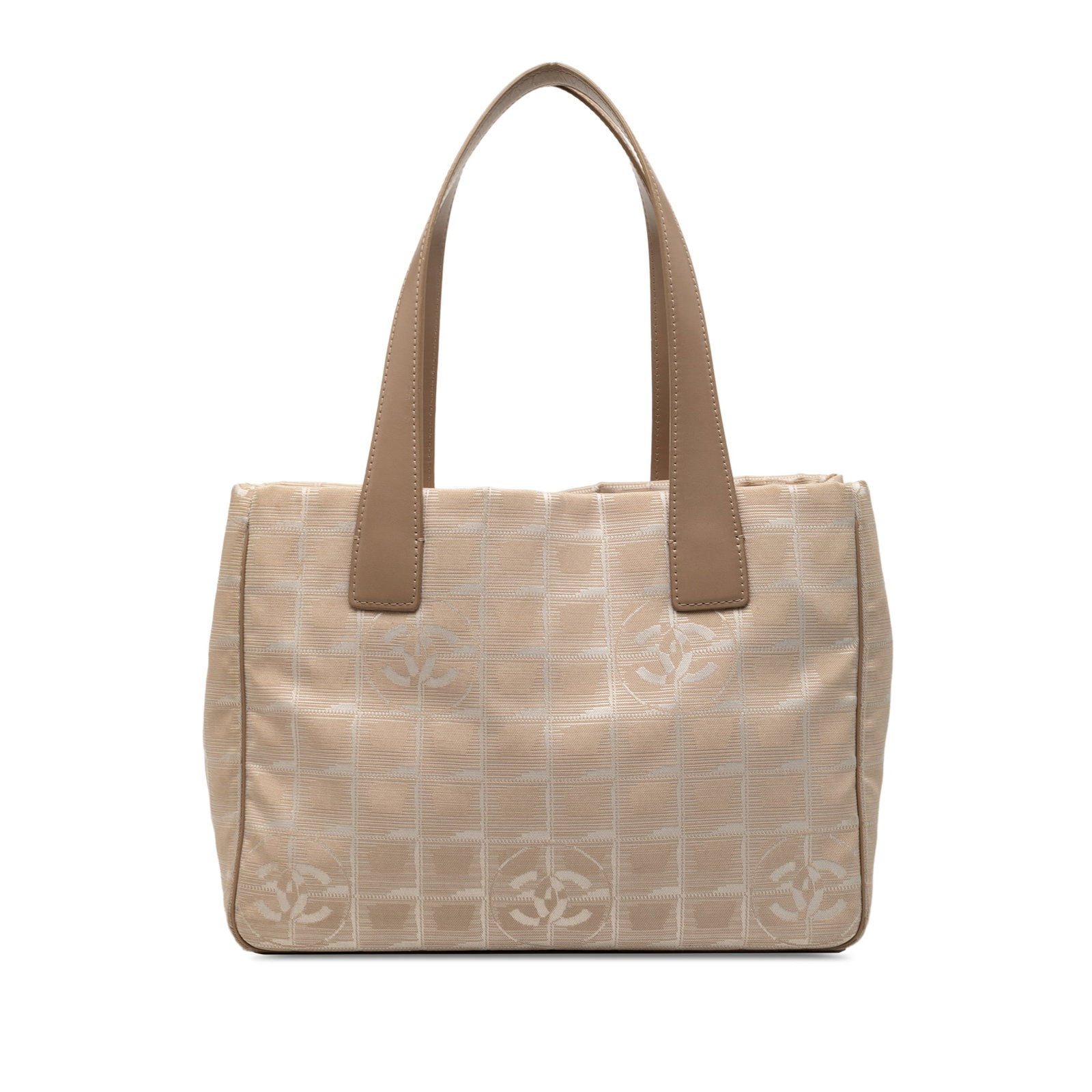 Beige Chanel New Travel Line Fabric Tote Bag with Leather Trim: Beige Chanel New Travel Line Fabric Tote Bag with Leather Trim This Chanel New Travel Line Nylon Tote features a beige nylon body with leather trim and flat leather straps. The bag has an open top des