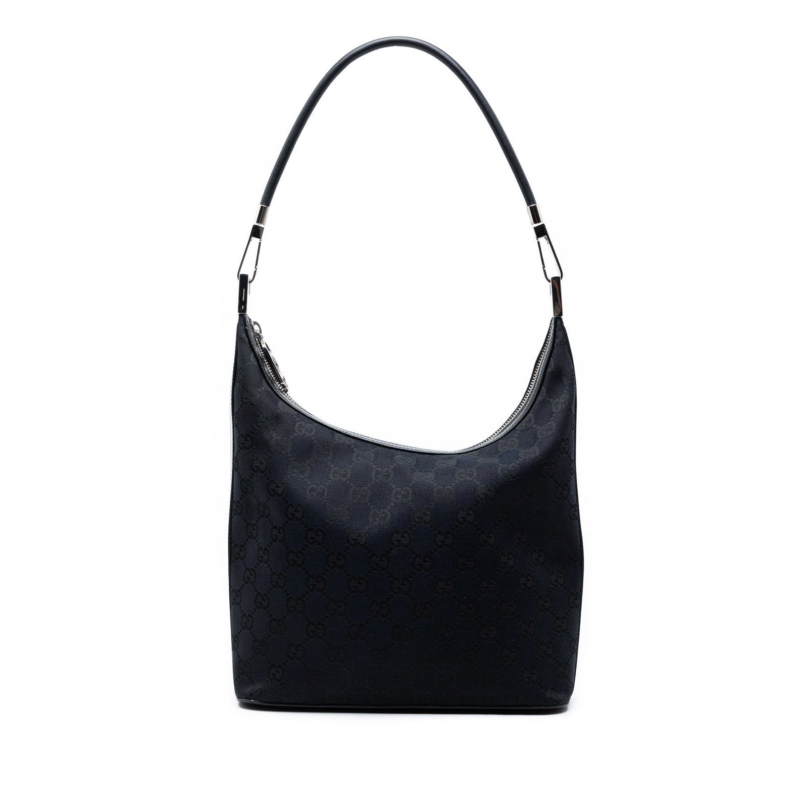 Gucci Blue Canvas Shoulder Bag with Leather Trim: Gucci Blue Canvas Shoulder Bag with Leather Trim This Gucci GG Canvas Shoulder Bag features a durable canvas body accented with leather trim and a rolled leather strap. It is designed with a top zip c