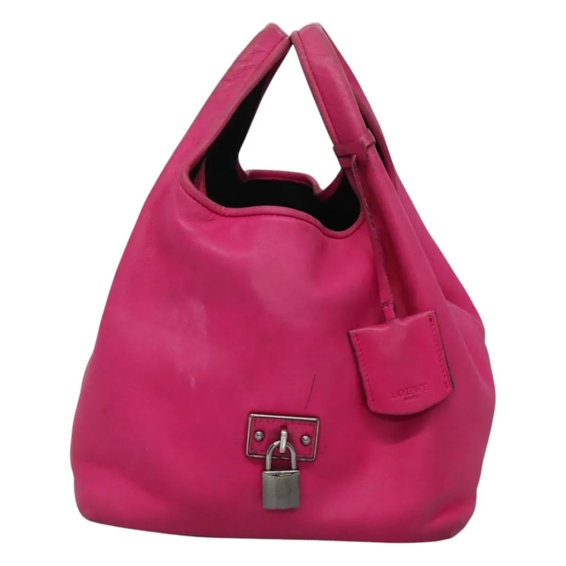 Loewe Vintage Pink Leather Handbag Spain: Loewe Vintage Pink Leather Handbag Spain Vintage Loewe leather bag in pink with a fair vintage condition and honest wear. The exterior shows shape loss, light wear, and light marks. The handle has lig