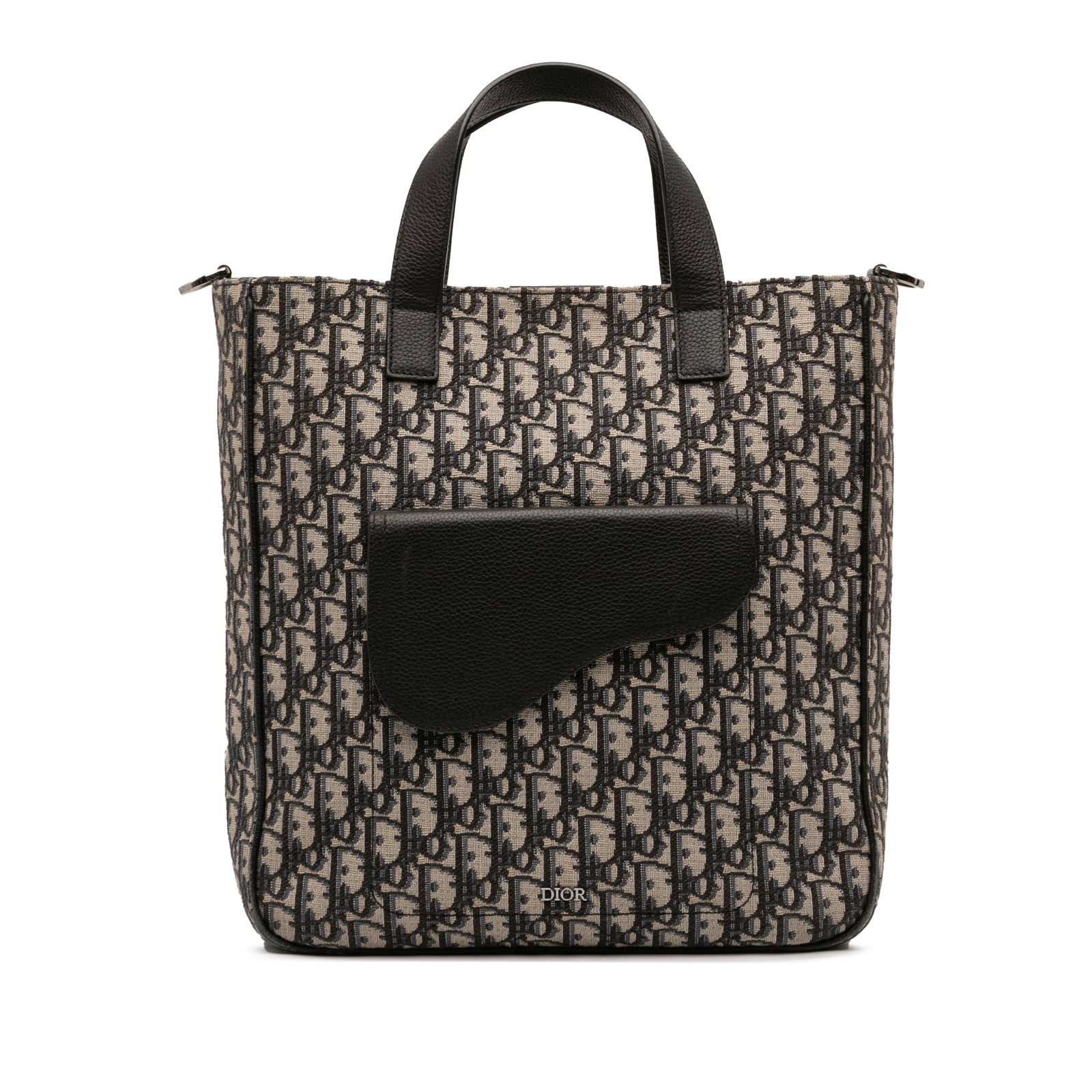 Dior Oblique Canvas Leather Saddle Tote Bag Blue: Dior Oblique Canvas Leather Saddle Tote Bag Blue This Dior Oblique Canvas and Leather Saddle Tote showcases a blue canvas body with leather trim, flat leather handles, and an open top secured by a mag