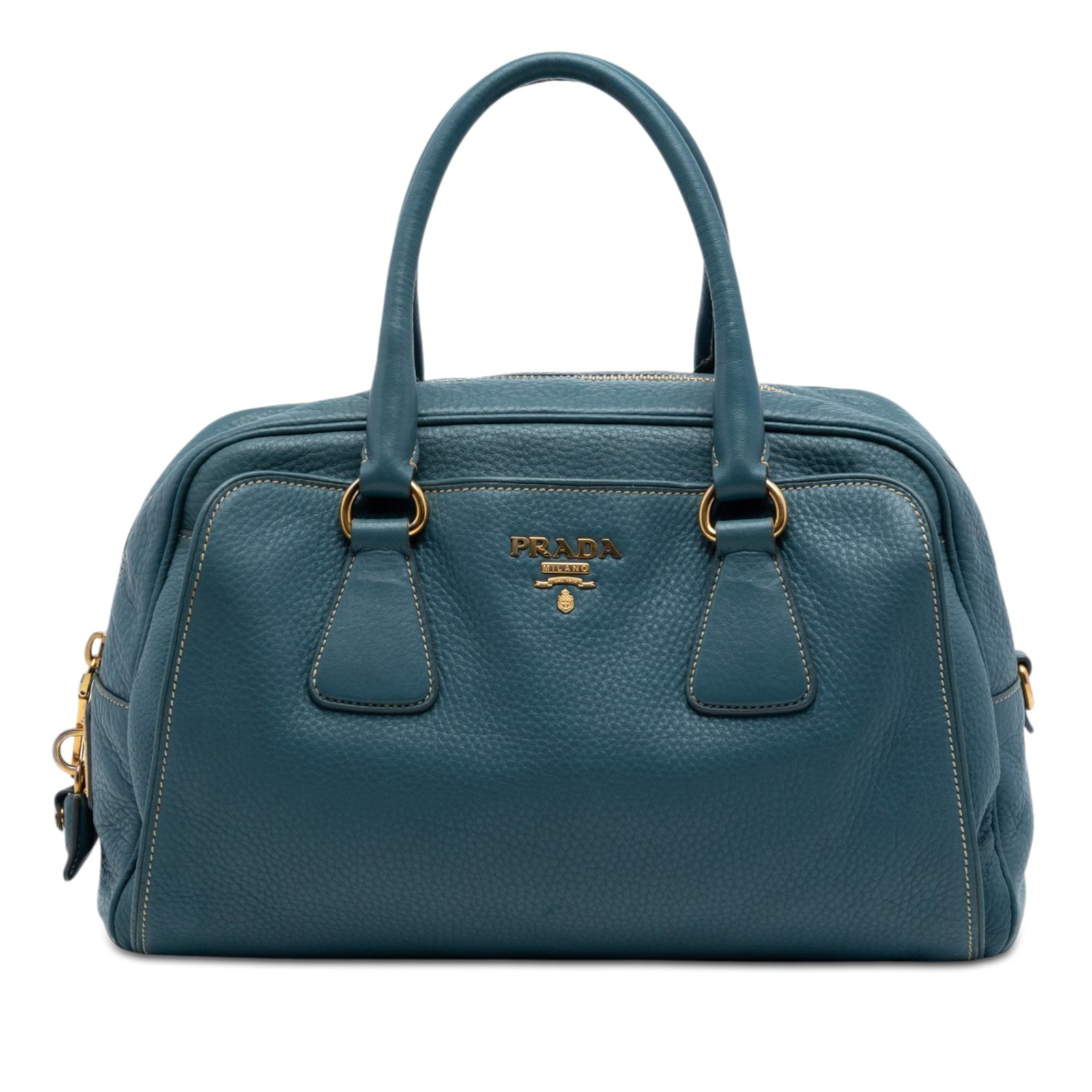 Prada Vitello Daino leather blue satchel bag: Prada Vitello Daino leather blue satchel bag The Prada Vitello Daino Bauletto Bag is a blue leather satchel crafted in Italy. It features a rolled leather handle design, a secure top zip closure, and 