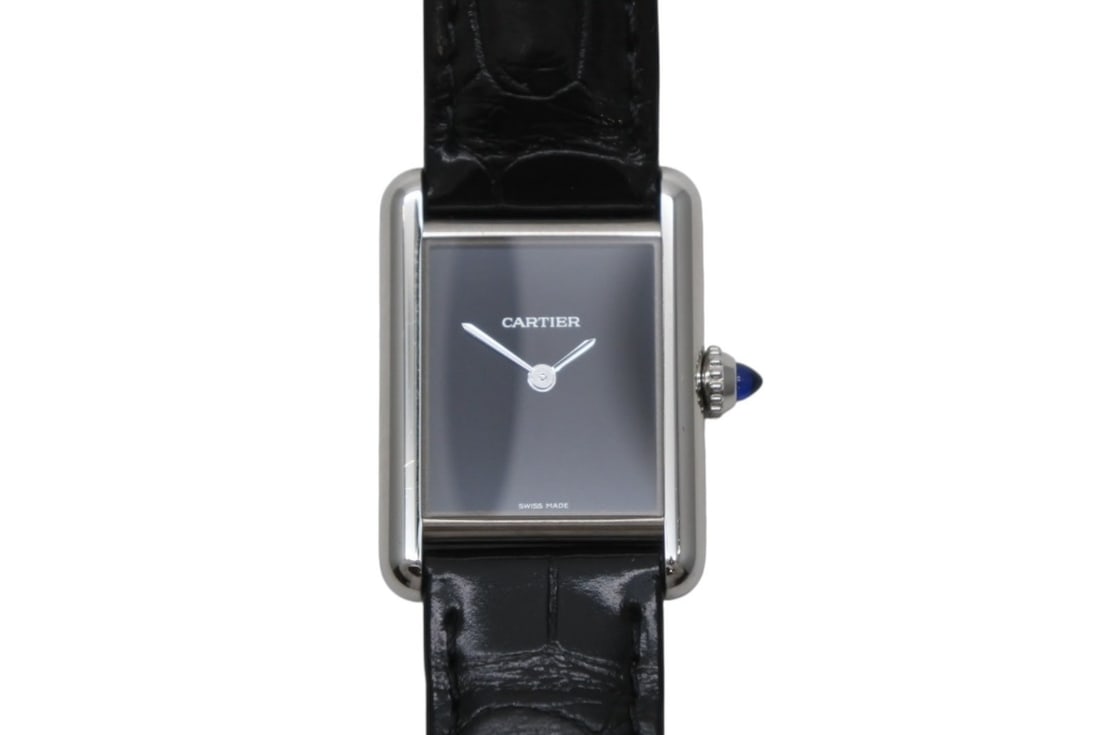Cartier WSTA0071 Tank Must SM Quartz Stainless Wristwatch: Cartier WSTA0071 Tank Must SM Quartz Stainless Wristwatch This Cartier Tank Must De Cartier Watch SM is a pre-owned unisex wristwatch with a stainless steel case and band. It features a quartz movemen