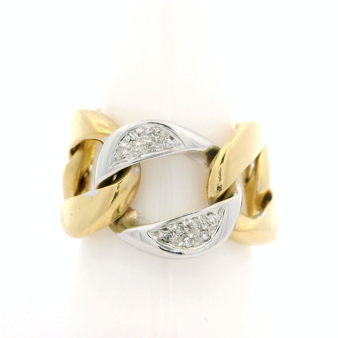 Diamond Pave Center Curb Link Band in 18k Yellow and White Gold Size 9: Diamond Pave Center Curb Link Band in 18k Yellow and White Gold Size 9 This women's band ring features a curb Cuban link design crafted from solid 18k yellow gold with a white gold center. The ring is