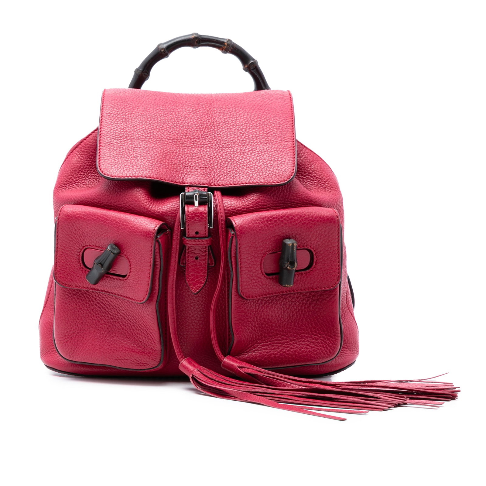 Pink Leather Backpack with Bamboo Handle and Tassel by Gucci: Pink Leather Backpack with Bamboo Handle and Tassel by Gucci This Gucci Leather Bamboo Tassel Backpack features a pink leather body with a bamboo top handle and adjustable flat leather back straps. Th