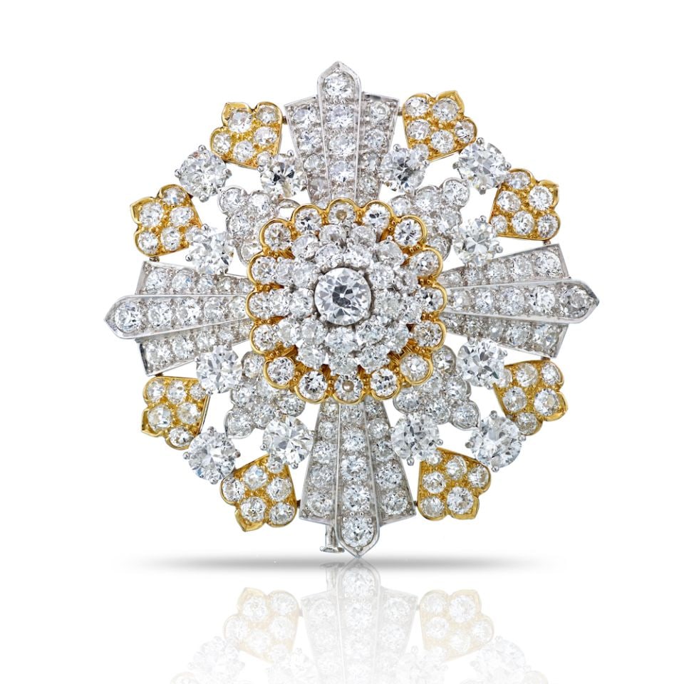 David Webb Floral Brooch 40 Carat Old Cut Diamonds Platinum 18K Gold: David Webb Floral Brooch 40 Carat Old Cut Diamonds Platinum 18K Gold This exquisite David Webb brooch features a stunning floral design adorned with approximately 40 carats of old-cut diamonds, primar