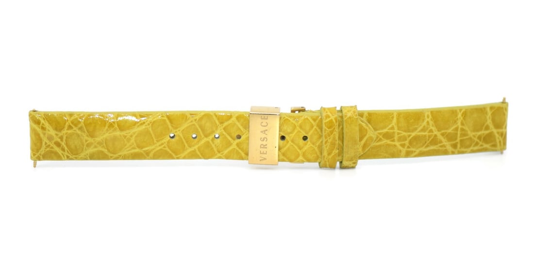 Versace 16mm Yellow Leather Wristwatch Band: Versace 16mm Yellow Leather Wristwatch Band This is a pre-owned Versace yellow leather wristwatch band with a width of 16mm. The strap is 100% authentic and was made in Switzerland, offering a stylish