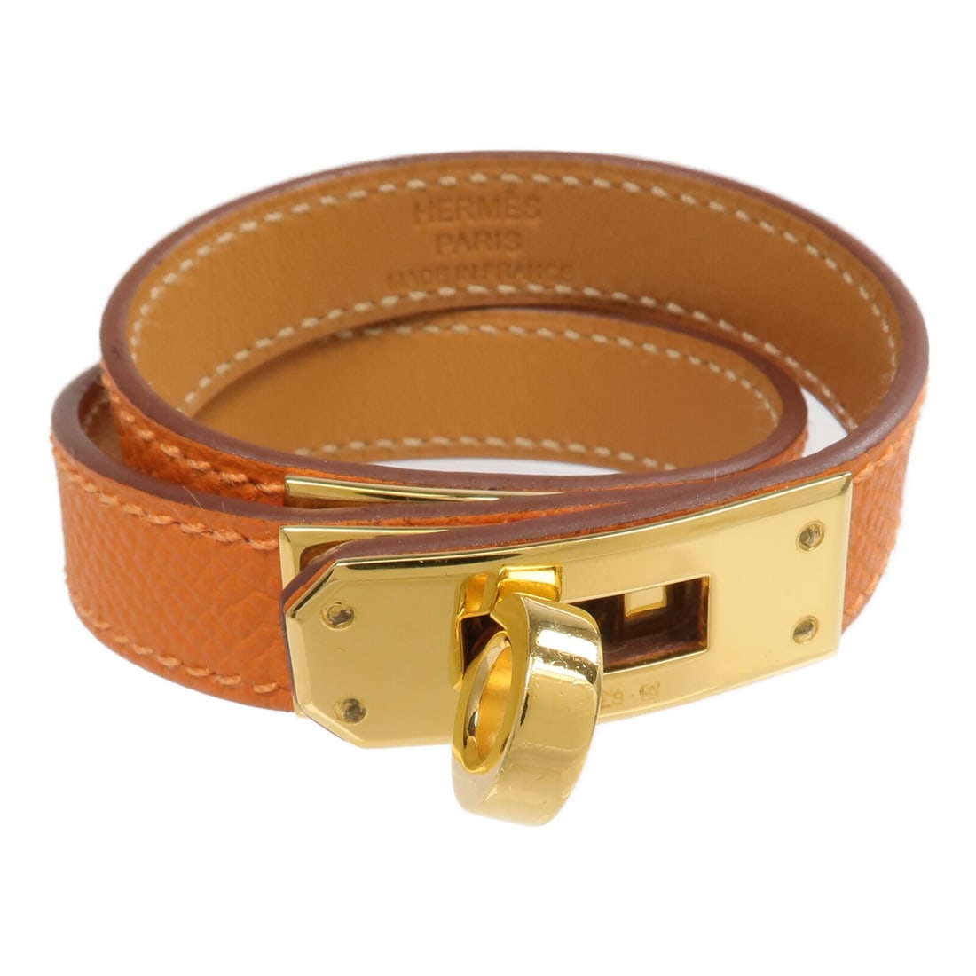 Hermes Kelly Double Tour Bracelet Orange Epsom Leather Gold Tone: Hermes Kelly Double Tour Bracelet Orange Epsom Leather Gold Tone This Hermes Kelly Double Tour bracelet is crafted in orange Epsom leather and calfskin (cowhide), with gold-tone hardware. It is a wome