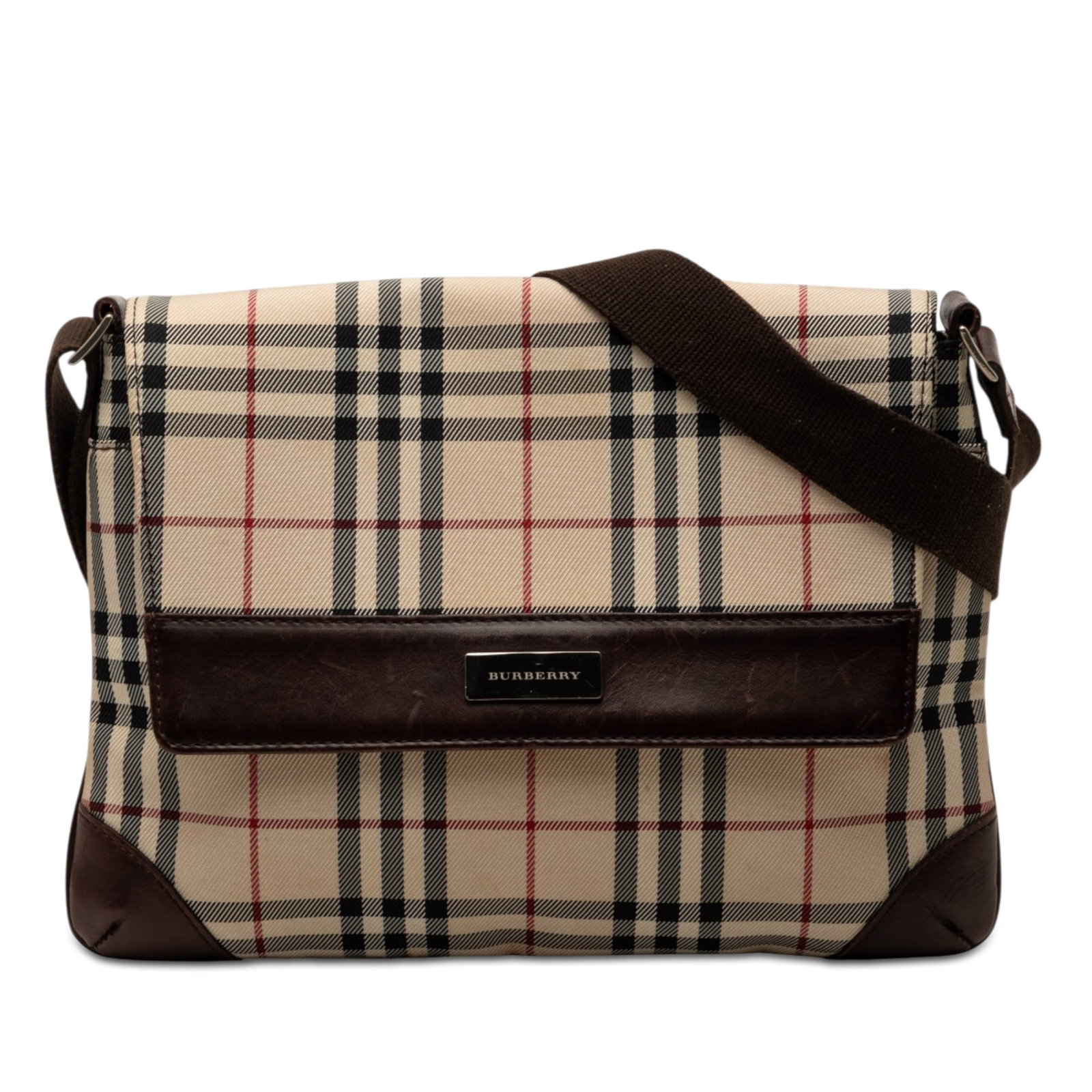 Burberry house check canvas flap bag crossbody: Burberry house check canvas flap bag crossbody This Burberry House Check Canvas Flap Crossbody bag features the iconic house check canvas body with leather trim and an adjustable flat canvas strap. Th