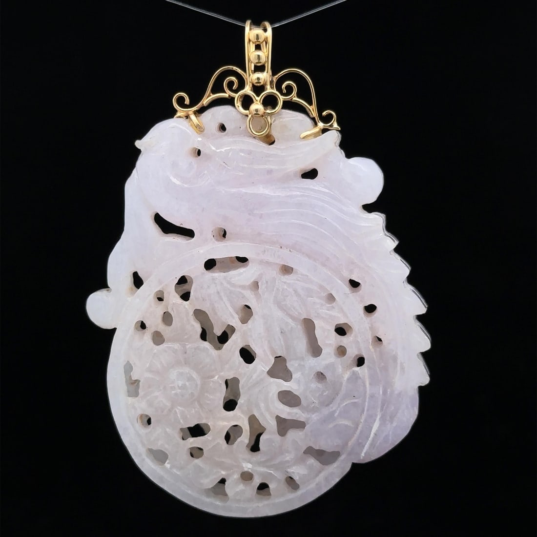 Vintage 14k Yellow Gold Large Lavender Jade Phoenix Pendant: Vintage 14k Yellow Gold Large Lavender Jade Phoenix Pendant This exquisite vintage pendant showcases a beautifully carved natural jade piece depicting a phoenix amidst a serene garden scene. The soft 