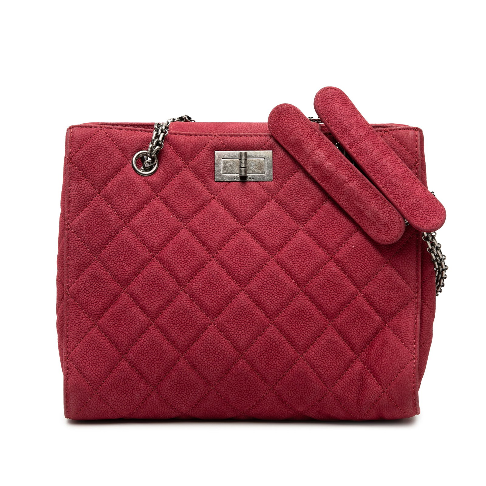 Chanel red quilted caviar leather 2.55 tote bag: Chanel red quilted caviar leather 2.55 tote bag This Chanel Quilted Caviar Reissue 2.55 Tote is crafted from durable quilted caviar leather in a striking red color. It features curb chain straps, an o