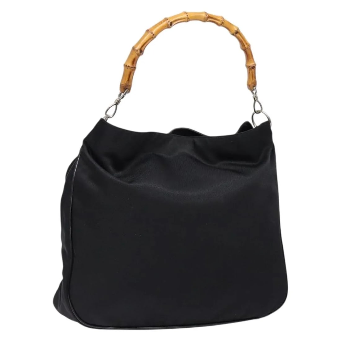 Black Nylon Gucci Tote with Bamboo Handle Vintage Style: Black Nylon Gucci Tote with Bamboo Handle Vintage Style This Gucci Vintage Bamboo Handle Tote is crafted from black nylon with bamboo handles. Designed for women, this tote features a spacious interio