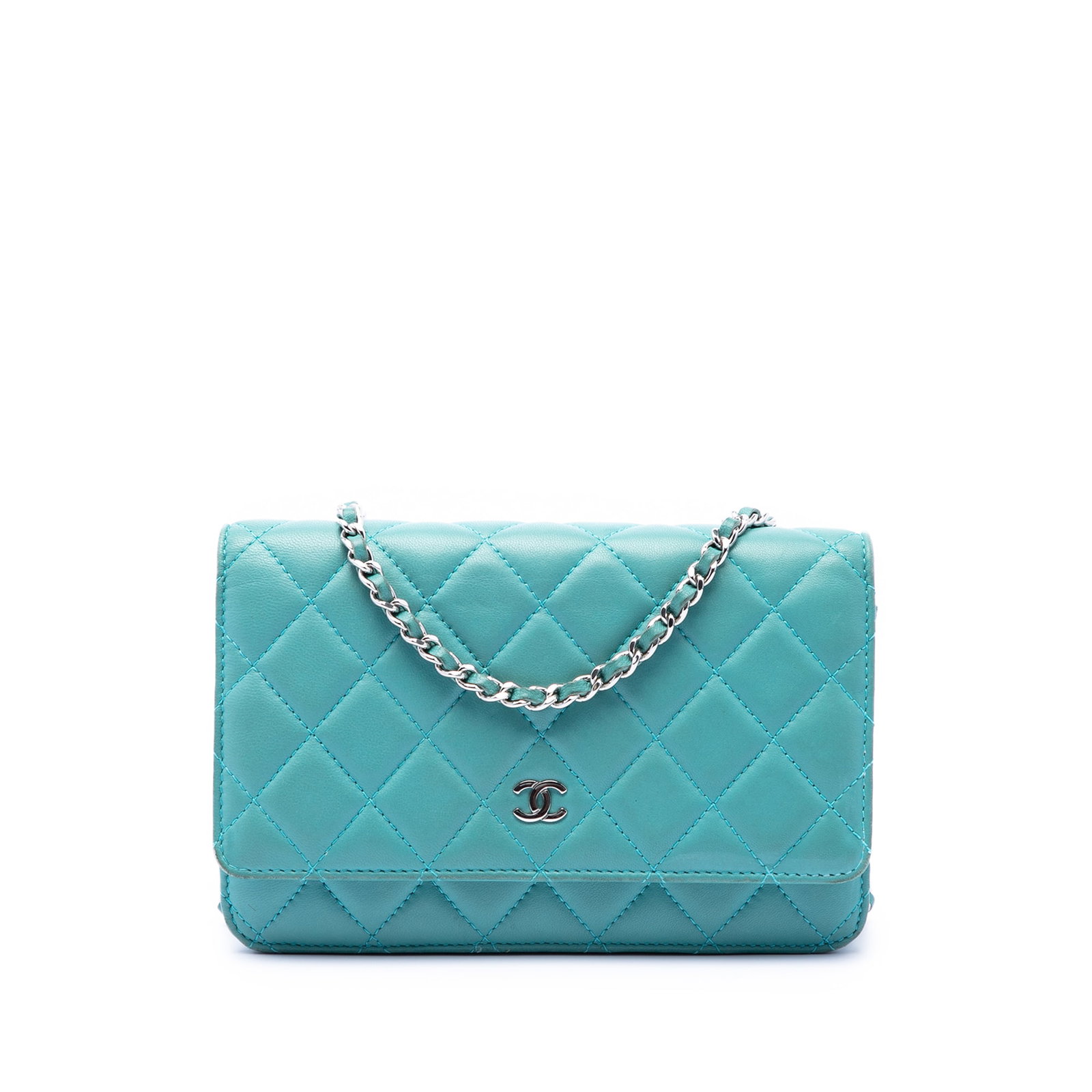 Chanel Blue Quilted Lambskin WOC Chain Bag: Chanel Blue Quilted Lambskin WOC Chain Bag This Chanel CC Quilted Lambskin Wallet On Chain features a blue quilted lambskin leather body with a leather-woven chain shoulder strap and a front flap secu