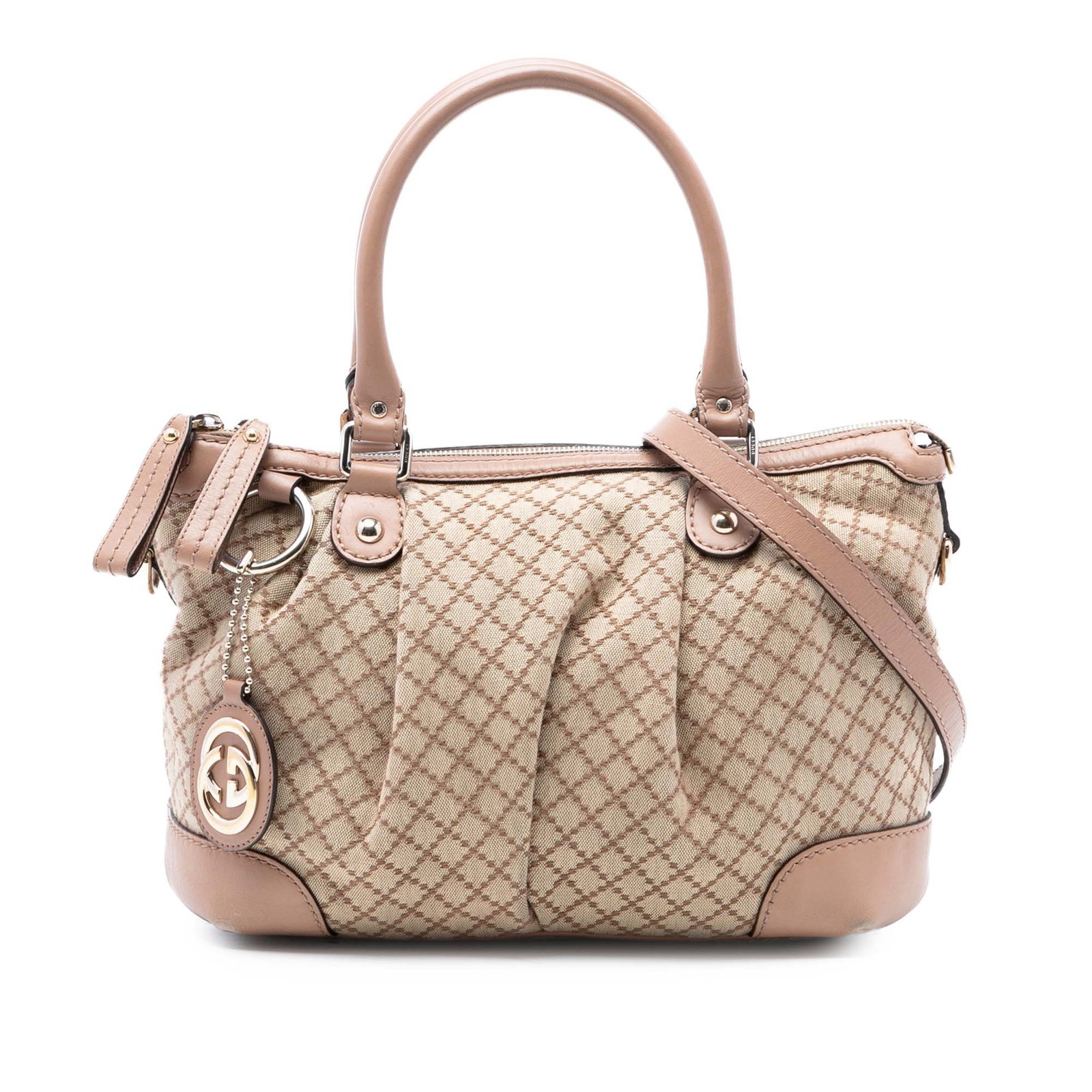 Gucci Sukey Beige Canvas Satchel with Leather Trim: Gucci Sukey Beige Canvas Satchel with Leather Trim This Gucci Diamante Canvas Sukey Satchel features a beige canvas body with leather trim, rolled leather handles, and a detachable flat leather strap.