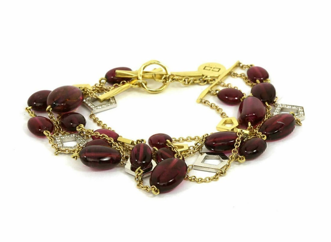 Ron Hami 18k Gold Pink Tourmaline 5 Strand Bracelet with Diamond Toggle: Ron Hami 18k Gold Pink Tourmaline 5 Strand Bracelet with Diamond Toggle This Ron Hami five-strand toggle bracelet is crafted in 18k yellow and white gold and features pink tourmaline beads accented wi