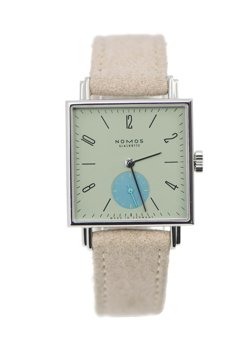 NOMOS Tetra 439 Salvia green dial stainless steel wristwatch with box: NOMOS Tetra 439 Salvia green dial stainless steel wristwatch with box NOMOS Tetra Salvia wristwatch with a square stainless steel case, silver fixed bezel, and polished finish. It features a green dia