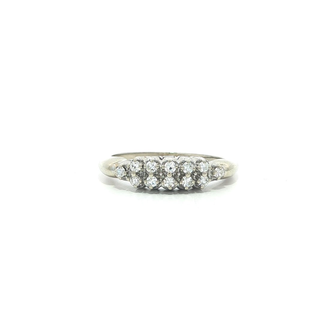 Two Row 14k White Gold Vintage Band with 0.18ctw Old Single Cut Diamonds: Two Row 14k White Gold Vintage Band with 0.18ctw Old Single Cut Diamonds This vintage band ring features twelve natural old single cut diamonds, totaling approximately 0.18 carats, set in two rows. Cr
