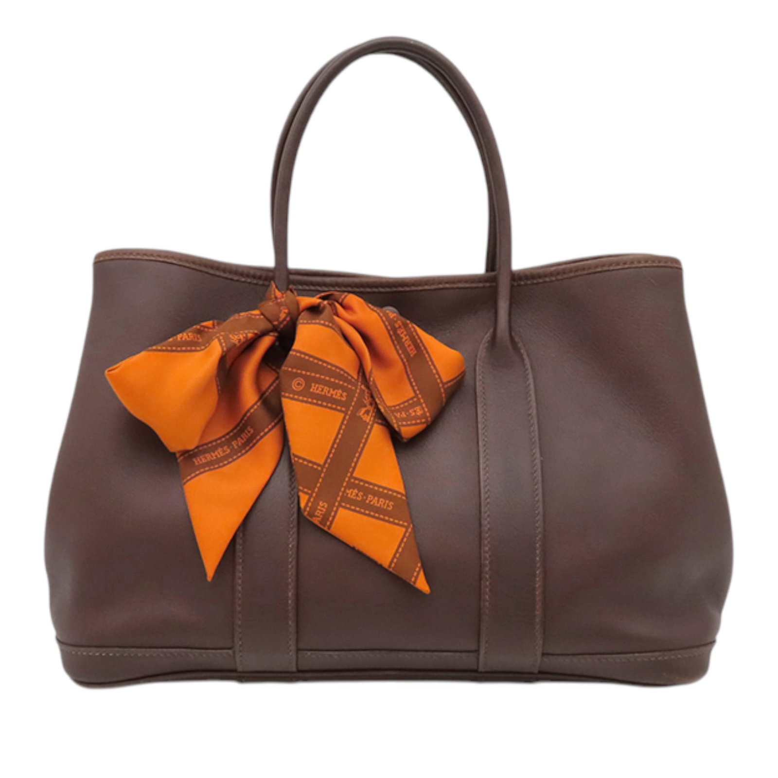 Hermes Garden Party 30 Swift Leather Bolduc Twilly Bag: Hermes Garden Party 30 Swift Leather Bolduc Twilly Bag This Hermes Garden Party 30 bag is crafted with a Havane Swift leather body and features rolled leather handles, a top snap button closure, and a