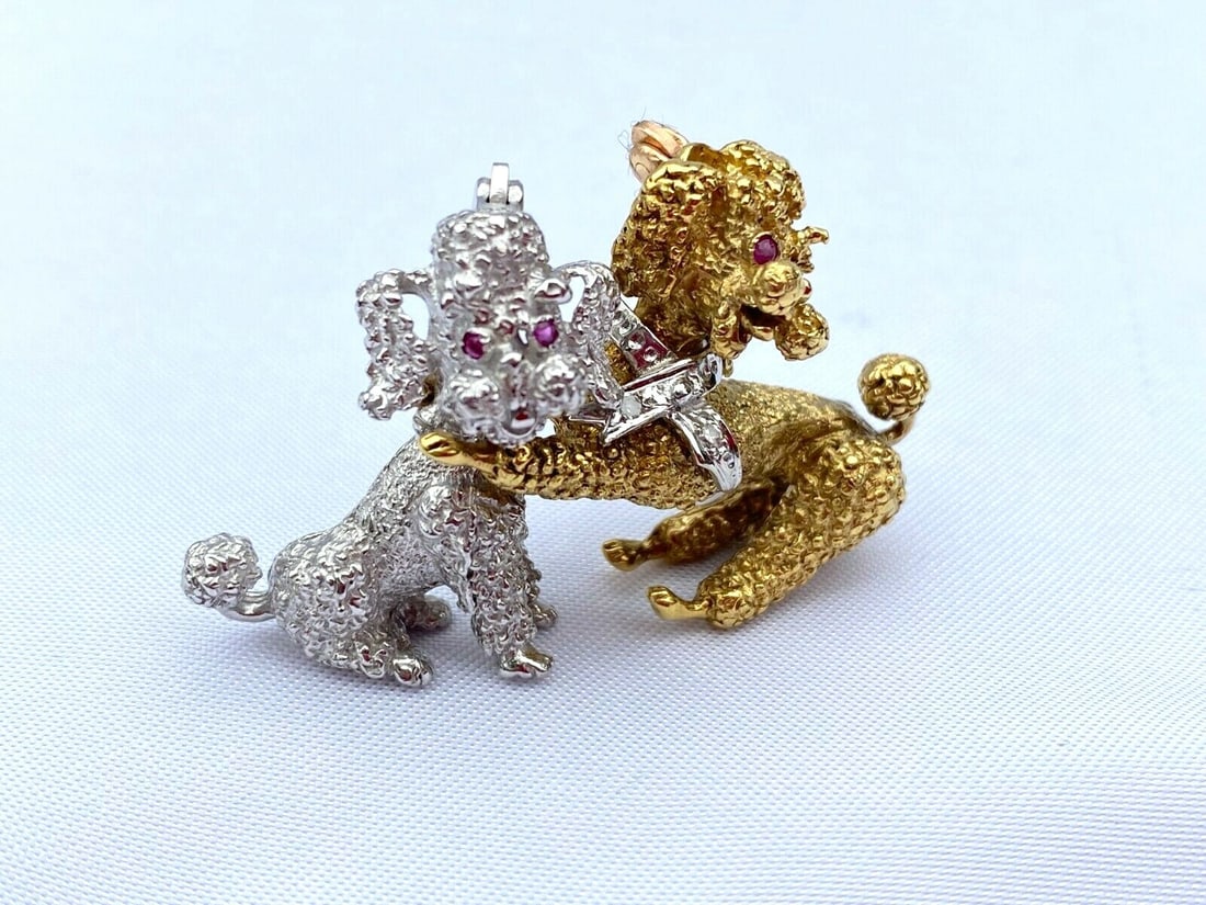 French 14K Gold Diamond Ruby Double Dog Brooch: French 14K Gold Diamond Ruby Double Dog Brooch This exquisite double dog brooch is crafted from 14K yellow and white gold, featuring stunning diamonds and rubies. The brooch, which can be easily separ