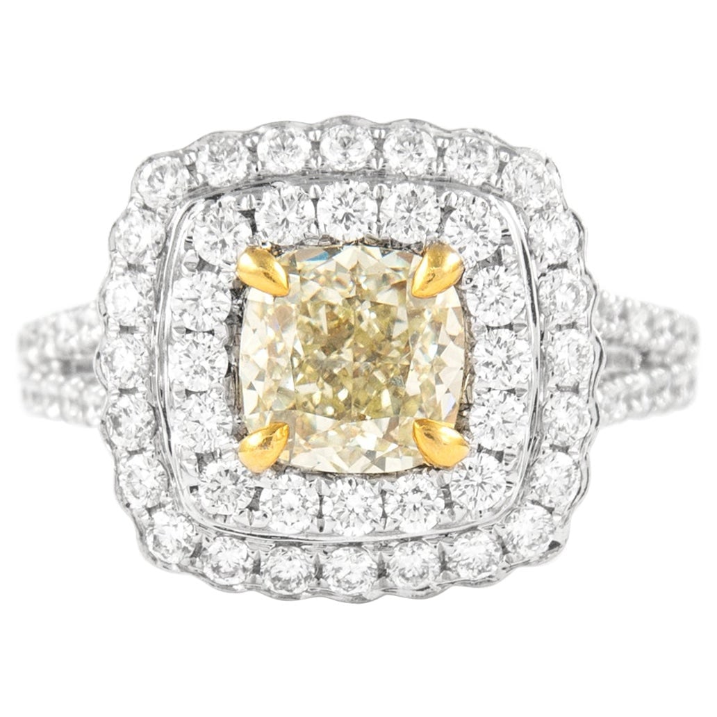 2.52ct Fancy Light Yellow Diamond Halo Ring 18k Gold EGL Certified: 2.52ct Fancy Light Yellow Diamond Halo Ring 18k Gold EGL Certified This exquisite halo ring features a stunning 2.52 carat Fancy Light Yellow diamond with VS2 clarity, elegantly set in a two-tone 18k 