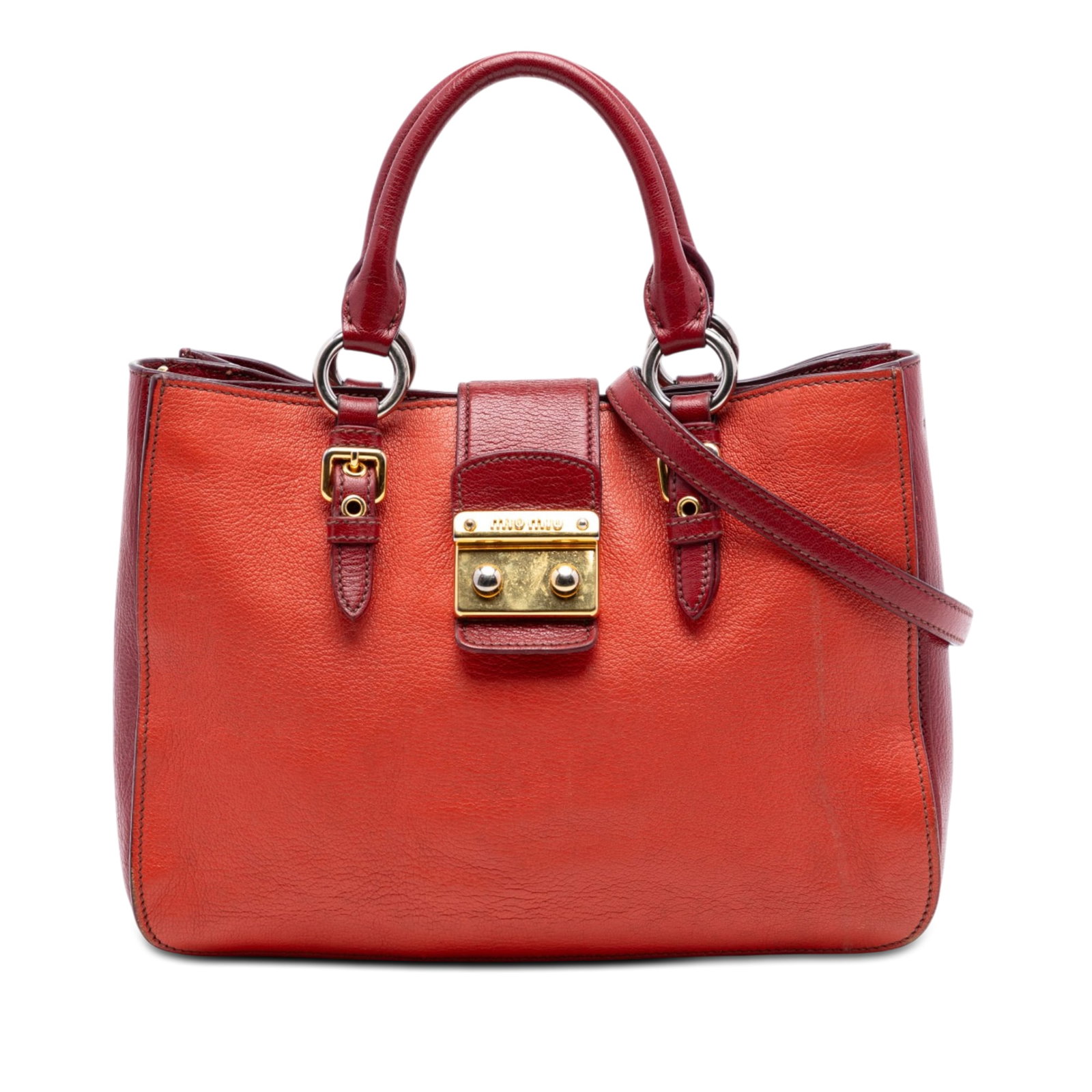 Miu Miu orange goatskin leather satchel with strap: Miu Miu orange goatskin leather satchel with strap This Miu Miu Bicolor Goatskin Madras Satchel features a goatskin leather body in a striking orange color. It is designed with rolled leather handles,