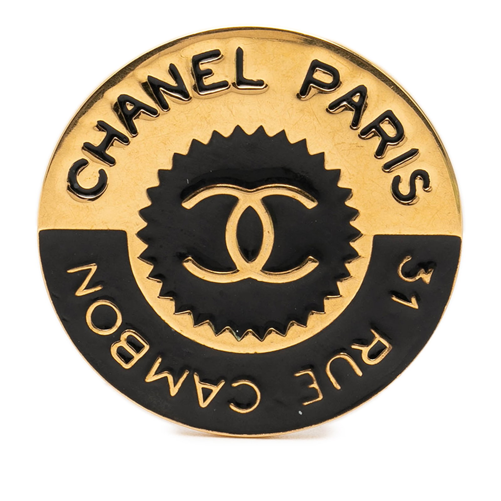 Chanel 31 Rue Cambon CC Enamel Gold Tone Brooch: Chanel 31 Rue Cambon CC Enamel Gold Tone Brooch Gold-tone Chanel brooch in enamel with a back pin closure. It is a costume accessory made in France and measures 4 cm by 4 cm. Condition is B+ with scra