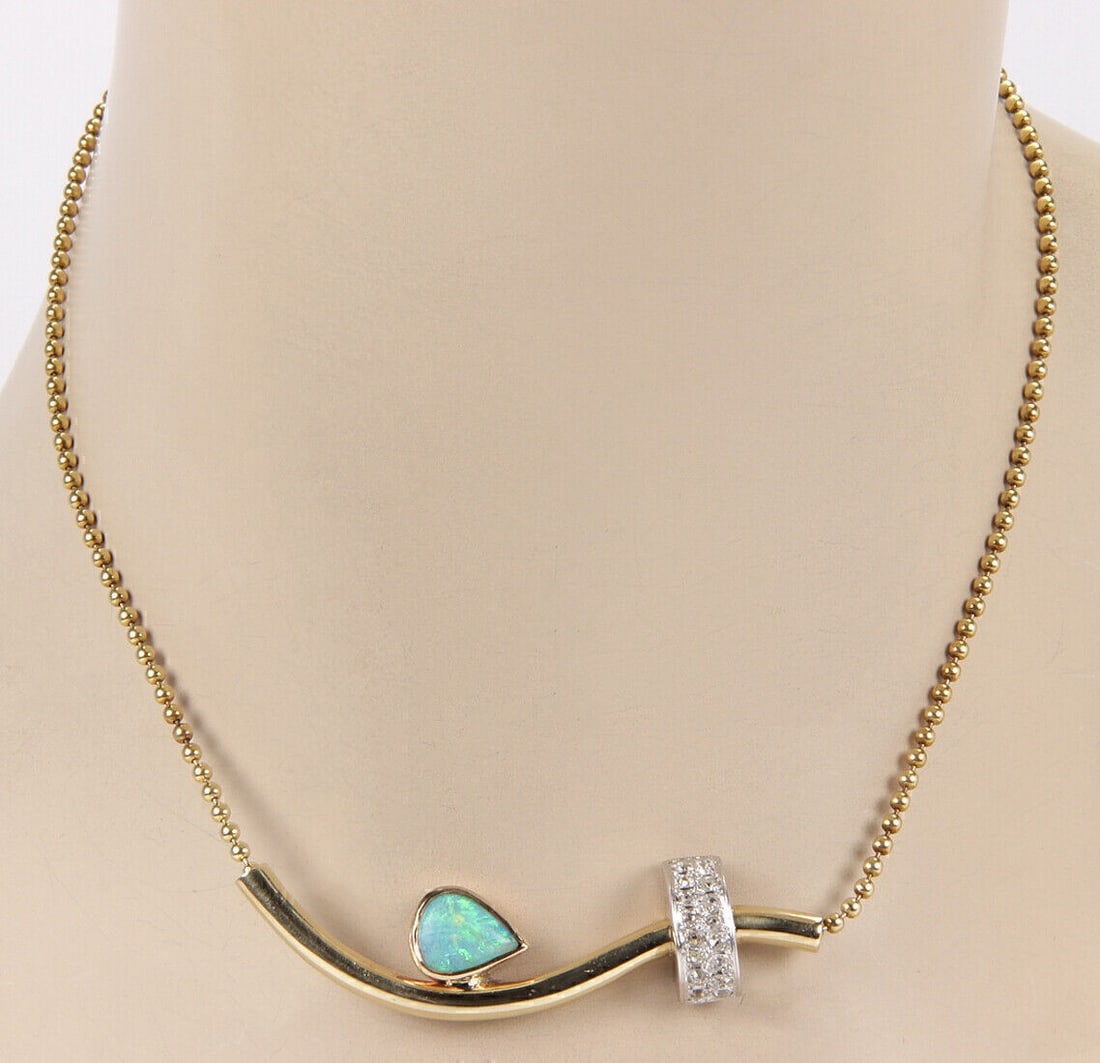 Vintage 14k Tri Color Gold Choker Necklace with Australian Opal and Diamonds: Vintage 14k Tri Color Gold Choker Necklace with Australian Opal and Diamonds This vintage estate choker necklace features Australian opal and diamond accents in 14k tri-color gold, combining yellow go