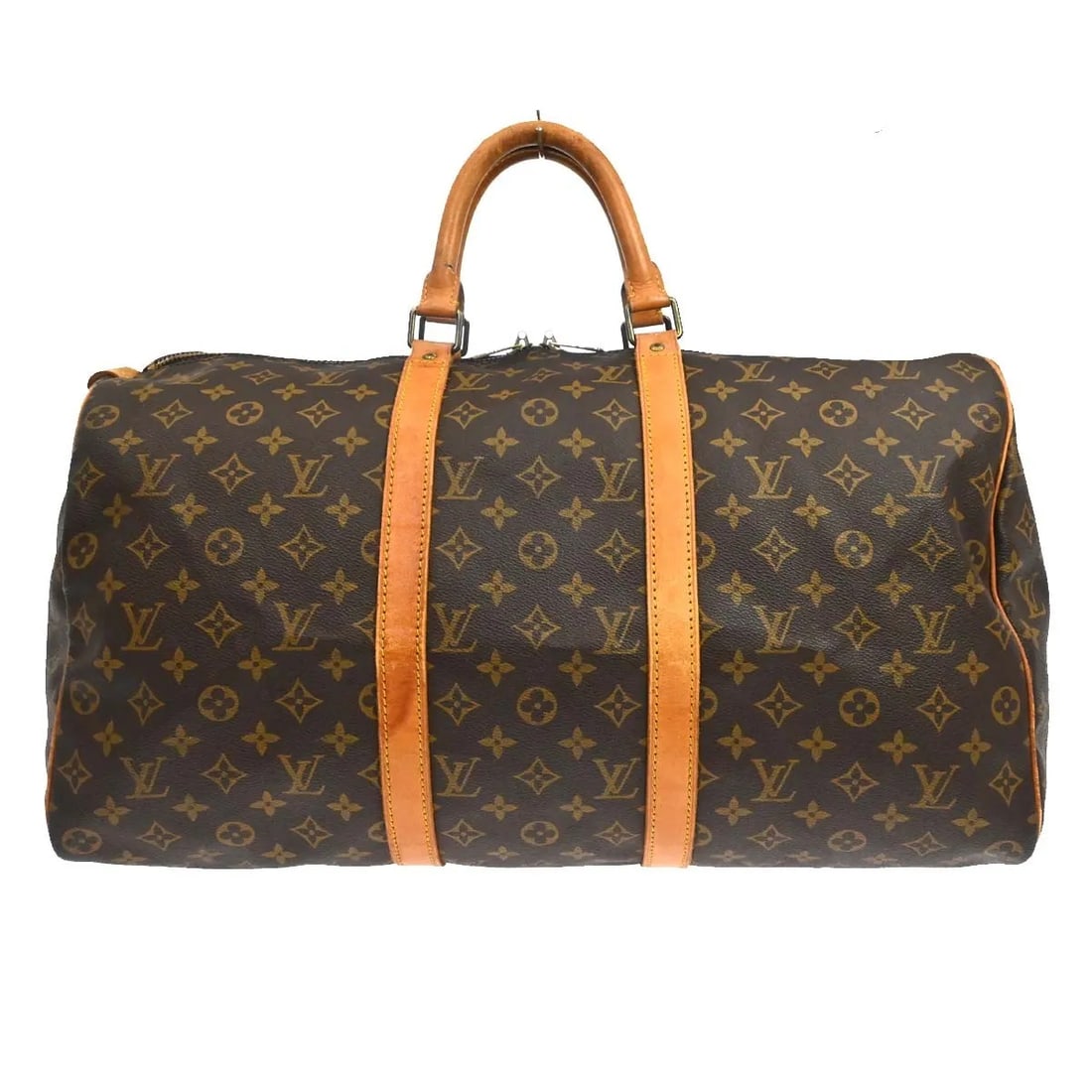 Louis Vuitton Keepall travel bag in brown monogram canvas: Louis Vuitton Keepall travel bag in brown monogram canvas Louis Vuitton Keepall in brown monogram canvas. This unisex bag is made in France and remains in good condition with visible wear from use. Th
