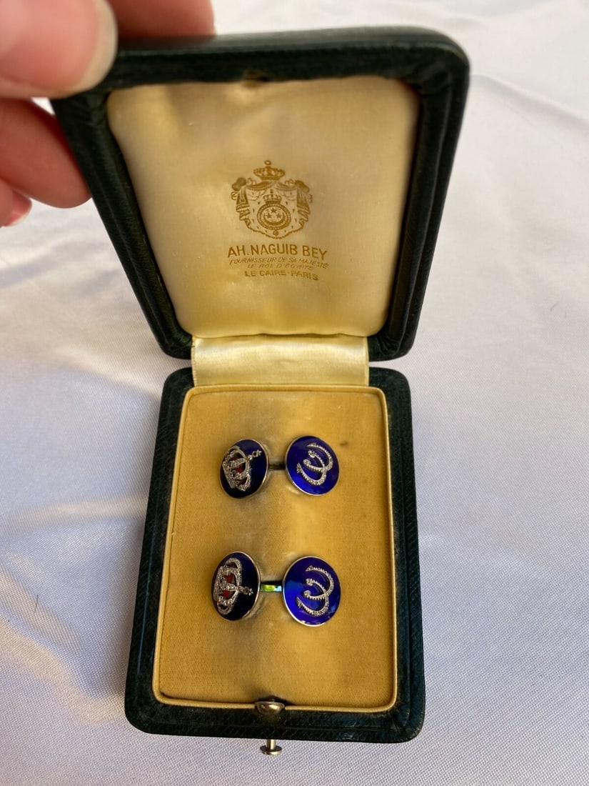King Farouk Platinum Diamond Enamel Cufflinks by AH Naguib Bey Paris: King Farouk Platinum Diamond Enamel Cufflinks by AH Naguib Bey Paris Discover a magnificent pair of cufflinks that once belonged to King Farouk of Egypt, crafted circa 1940 by AH Naguib Bey in Paris. 
