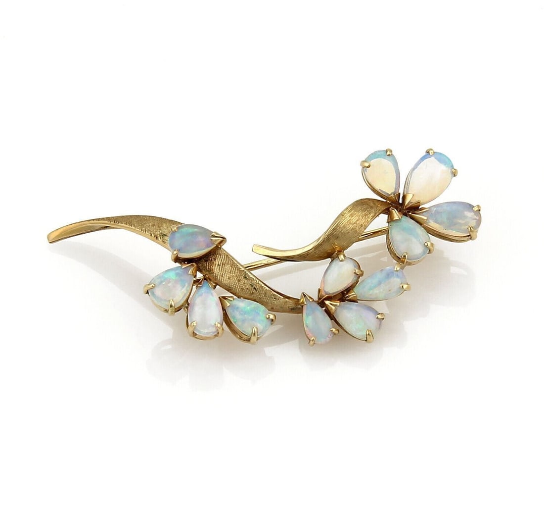 Vintage 14k Yellow Gold Floral Sprig Brooch with Opal: Vintage 14k Yellow Gold Floral Sprig Brooch with Opal Vintage estate opal floral and sprig pin brooch crafted in solid 14k yellow gold. The design features graceful botanical detailing accented by an 