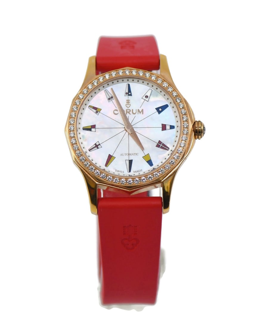 Corum Admiral's Cup Legend 18K Rose Gold Diamond Watch 400.100.85/0009: Corum Admiral's Cup Legend 18K Rose Gold Diamond Watch 400.100.85/0009 Introducing the Corum Admiral's Cup Legend, a stunning wristwatch that combines luxury and functionality. This exquisite timepiec