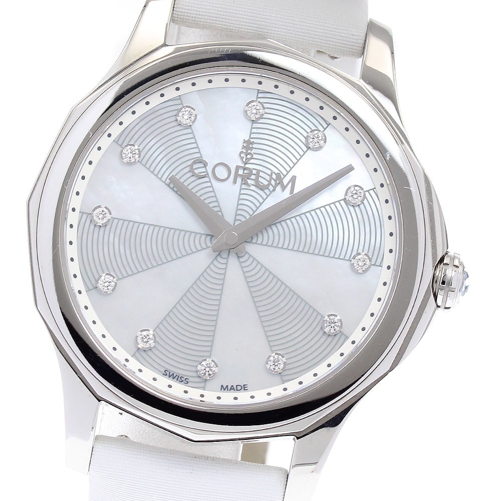 Corum Admiral's Cup Legend 38 Men's Quartz Wristwatch Ref A020 02663: Corum Admiral's Cup Legend 38 Men's Quartz Wristwatch Ref A020 02663 Corum Admiral's Cup Legend 38 men's quartz wristwatch, pre-owned and made in Switzerland. It features a stainless steel case, white