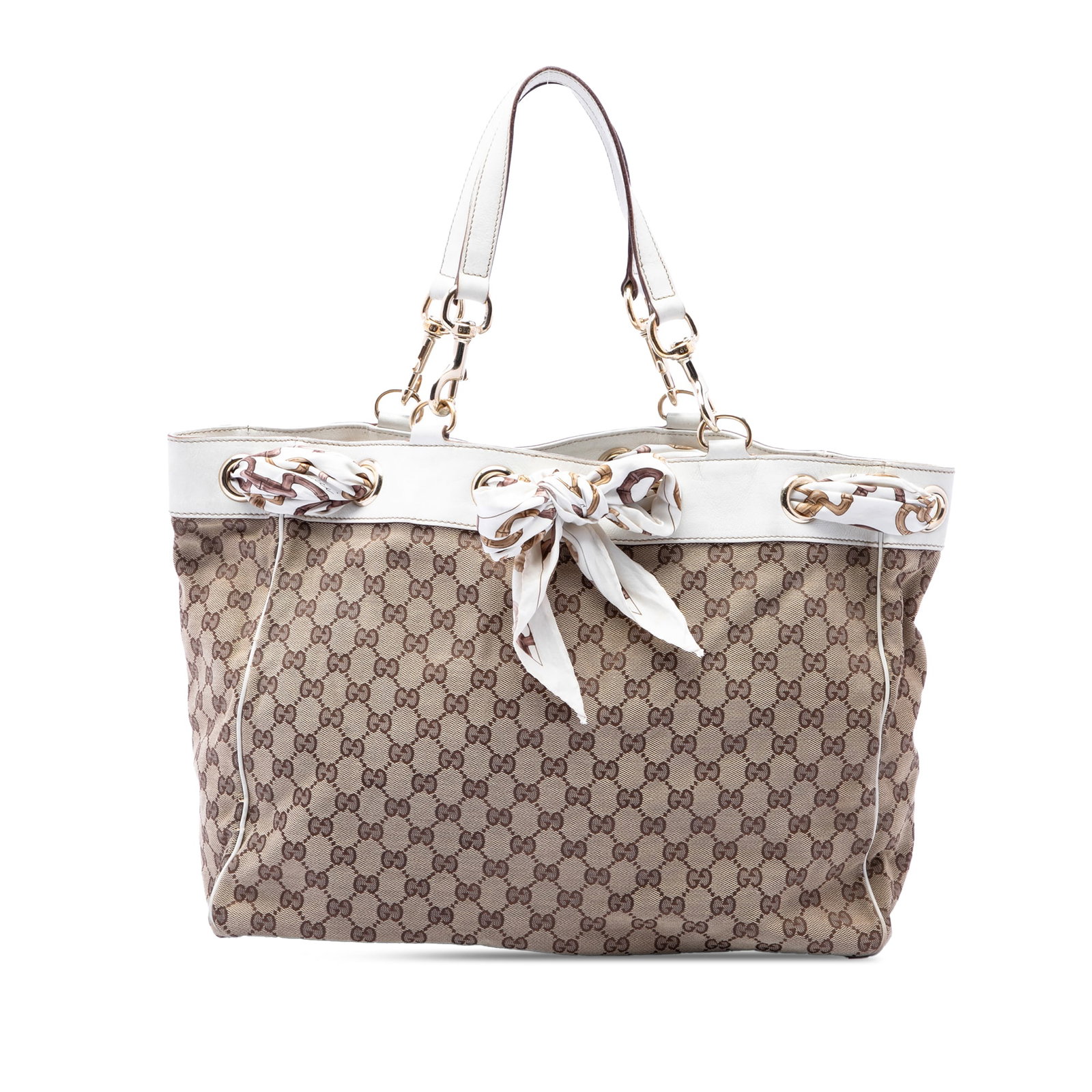 Gucci Positano Large GG Canvas Tote Bag Beige: Gucci Positano Large GG Canvas Tote Bag Beige Gucci Large GG Canvas Positano Tote crafted with a canvas body and leather trim. This tote features flat leather straps, an open top, and an interior with