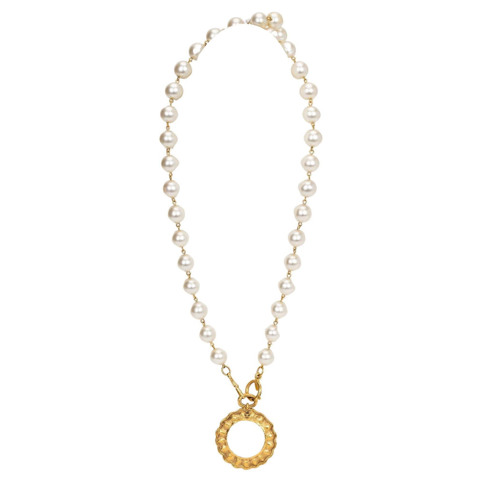 Chanel 1987 24k Gold Pearl Magnifier Necklace with Original Box: Chanel 1987 24k Gold Pearl Magnifier Necklace with Original Box This exquisite Chanel necklace from 1987 showcases a stunning magnifier pendant crafted in 24k gold. The necklace features beautiful pea