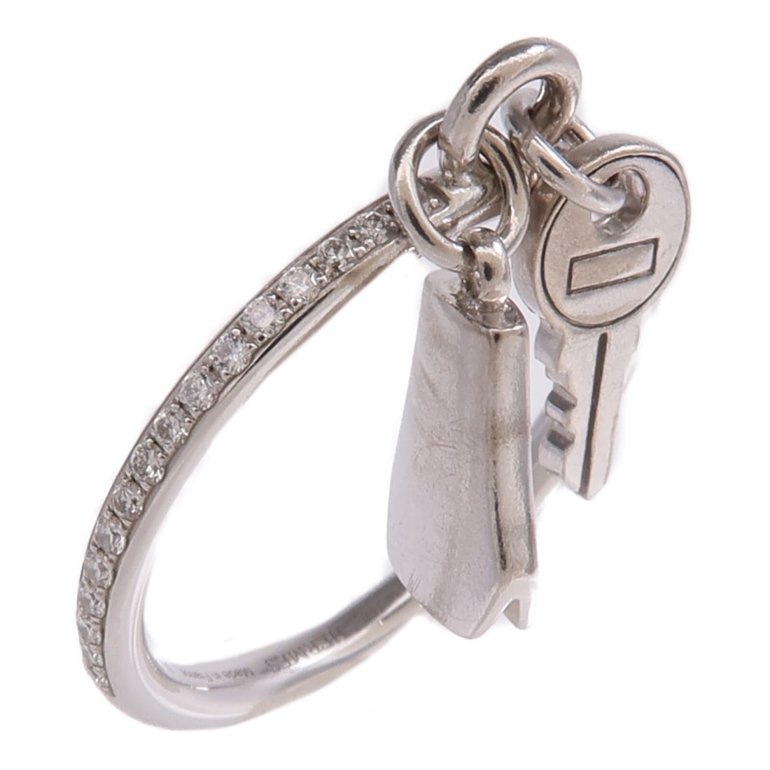 HERMES Kelly Clochette 18K White Gold Ring US 5.25: HERMES Kelly Clochette 18K White Gold Ring US 5.25 Hermes Kelly Clochette Ring in 18K white gold, presented in size 5.25 with an engraved 50. The ring features a clear and silver color presentation an