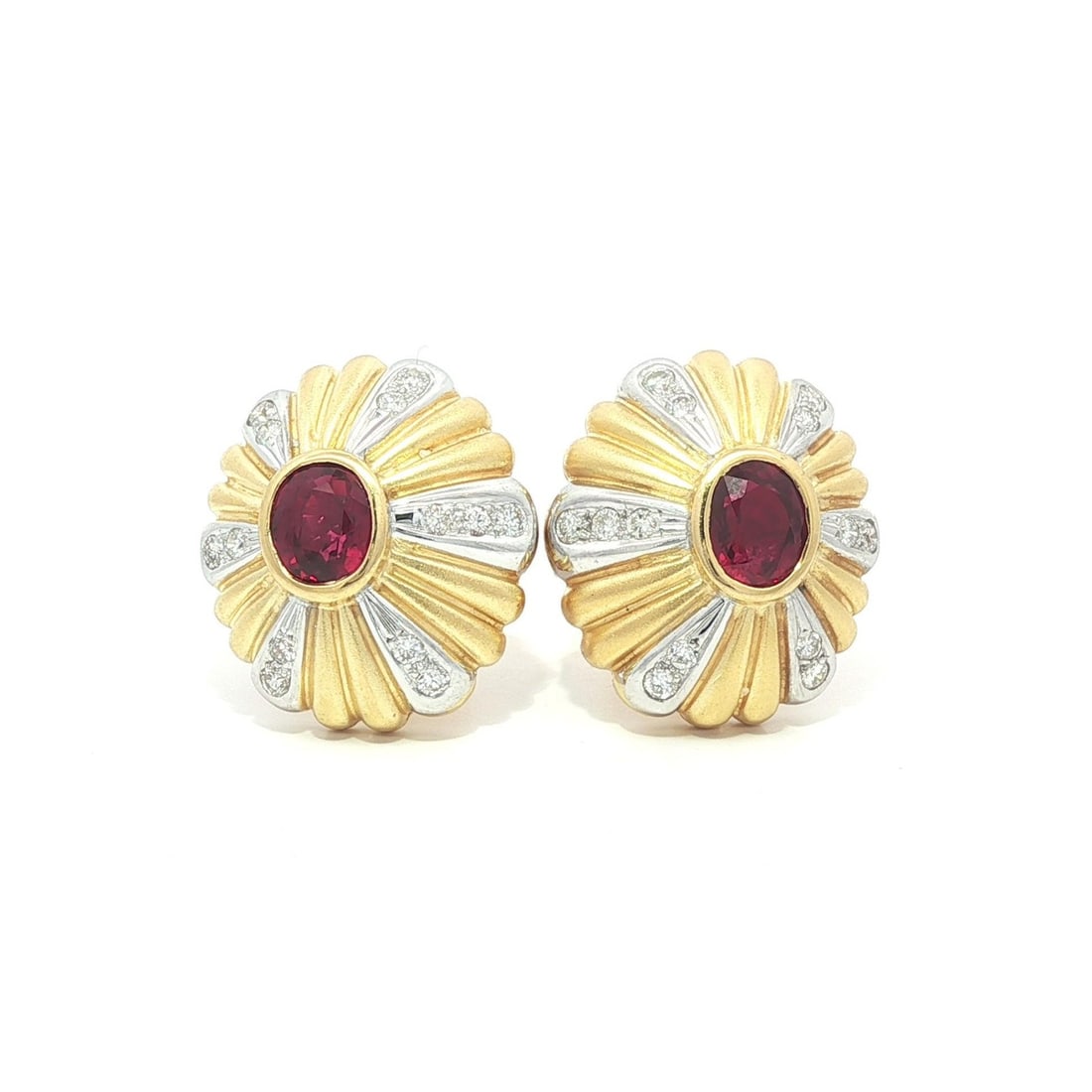 18k Yellow Gold GIA Certified Ruby Diamond Burst Stud Earrings: 18k Yellow Gold GIA Certified Ruby Diamond Burst Stud Earrings Enhance your elegance with these exquisite stud earrings featuring natural rubies and diamonds. Crafted in solid 18k yellow gold with whi