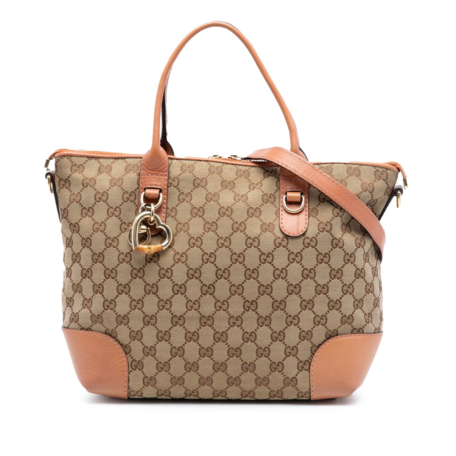 Gucci GG Canvas Beige Satchel with Heart Bit and Leather Trim: Gucci GG Canvas Beige Satchel with Heart Bit and Leather Trim This Gucci GG Canvas Heart Bit Satchel features a beige canvas body with leather trim, flat leather handles, a detachable flat leather str