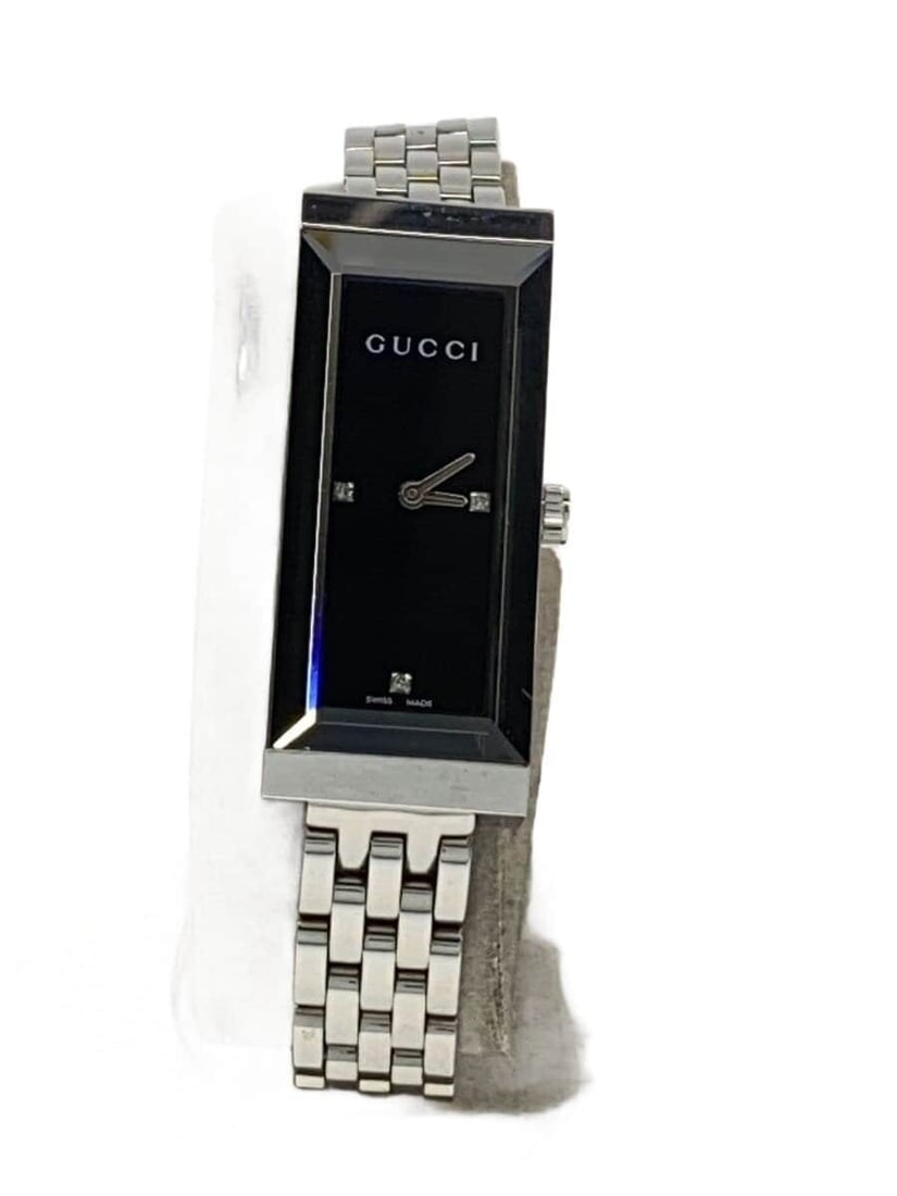 Gucci G-Frame Swiss Quartz Stainless Steel Diamond Ladies Watch YA127504: Gucci G-Frame Swiss Quartz Stainless Steel Diamond Ladies Watch YA127504 This Gucci G-Frame Quartz women's wristwatch features a sleek stainless steel construction with a silver finish. The watch is a